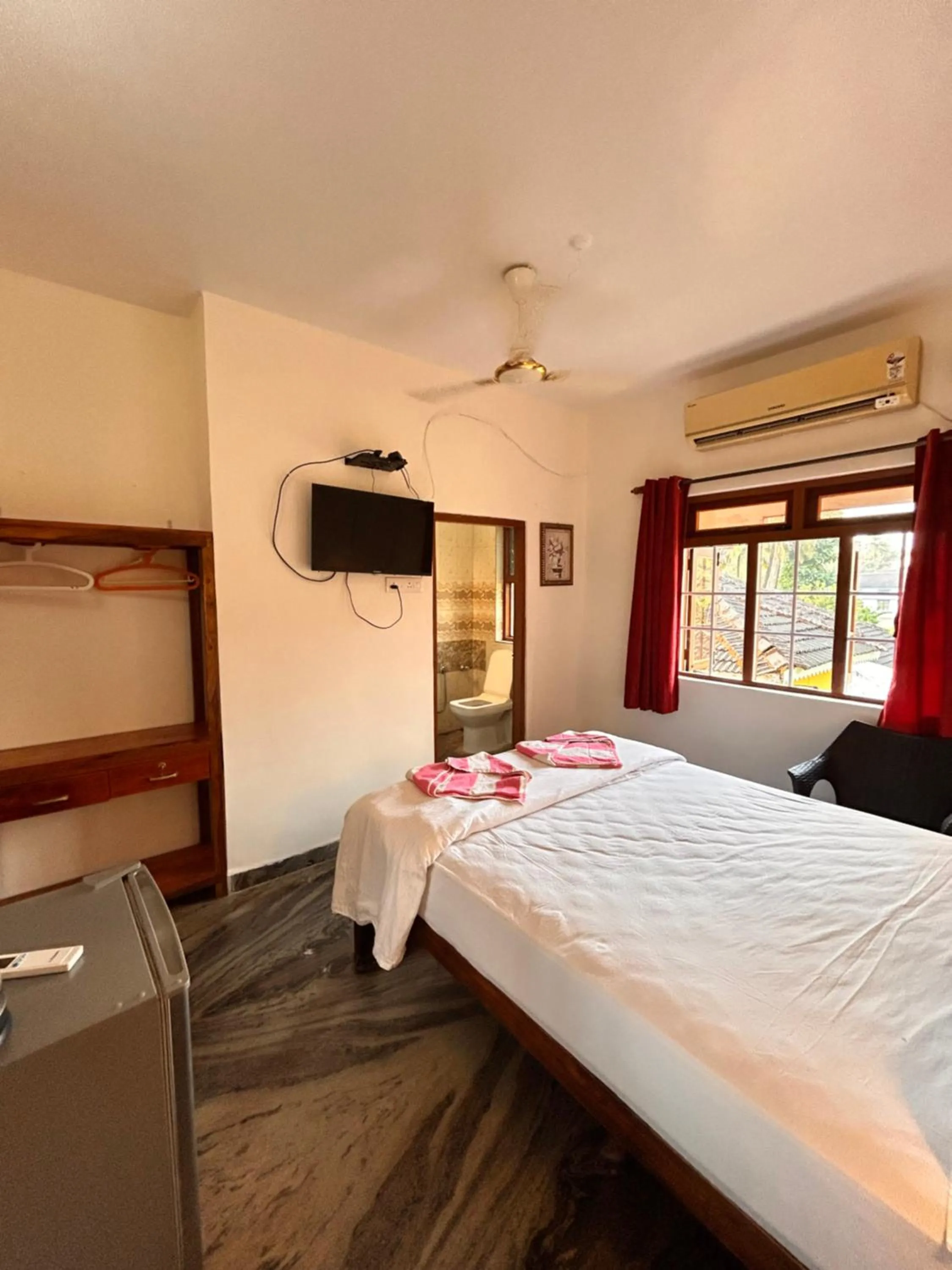 Bed in Maria Paulo Guest House Bar and Restaurant