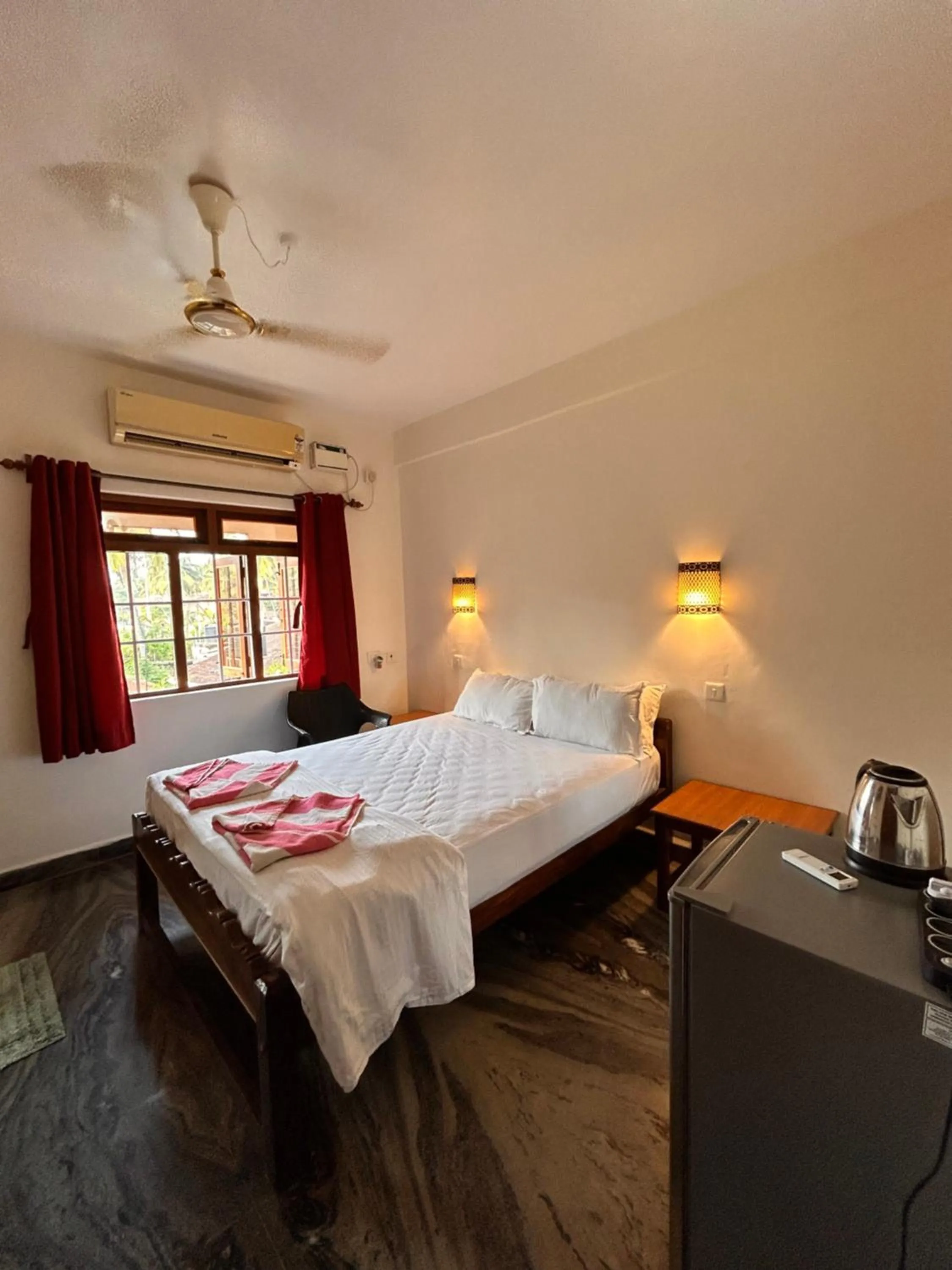 Bed in Maria Paulo Guest House Bar and Restaurant