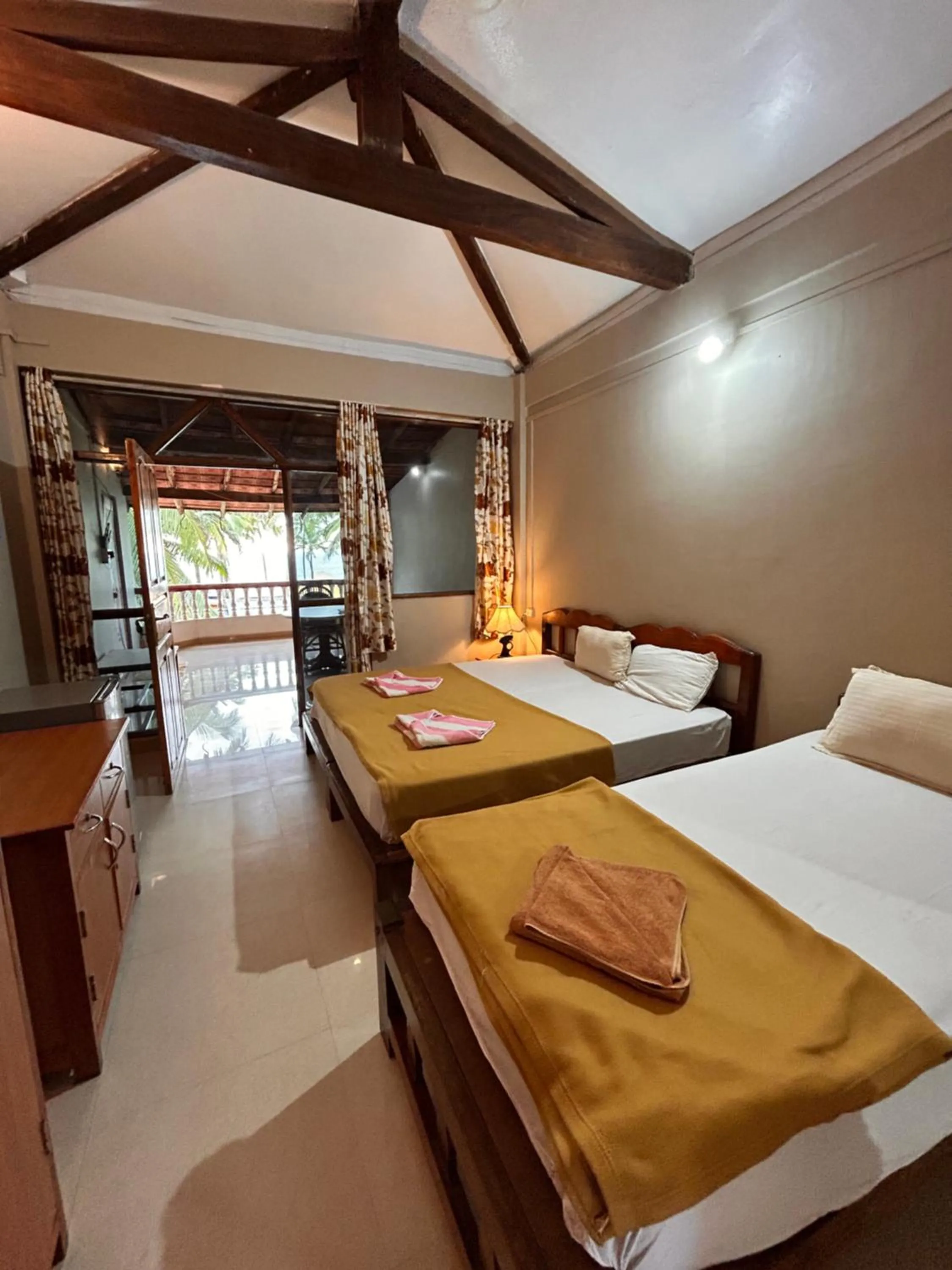 Bed in Maria Paulo Guest House Bar and Restaurant