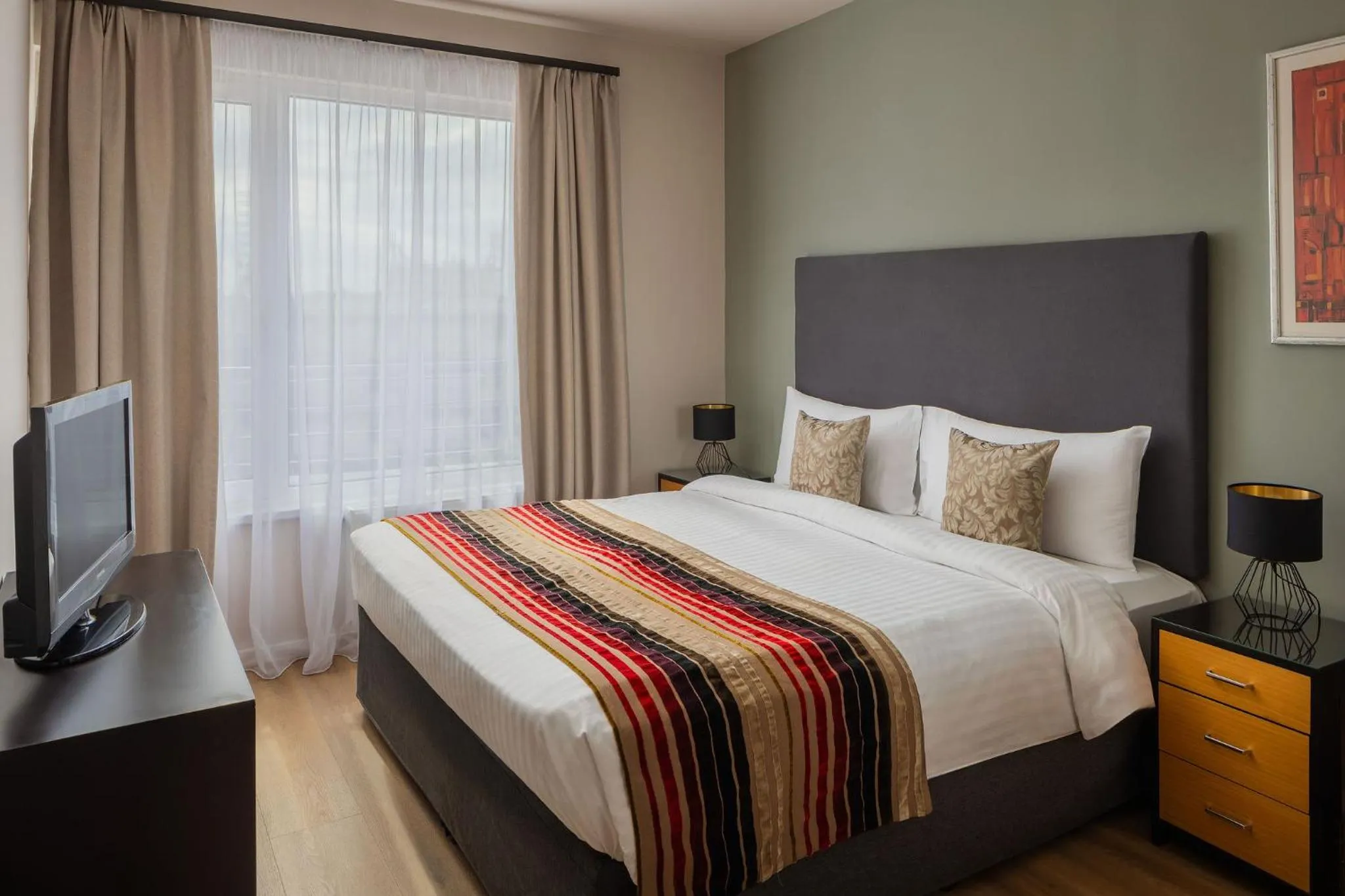 Bed in Escala Hotel & Suites