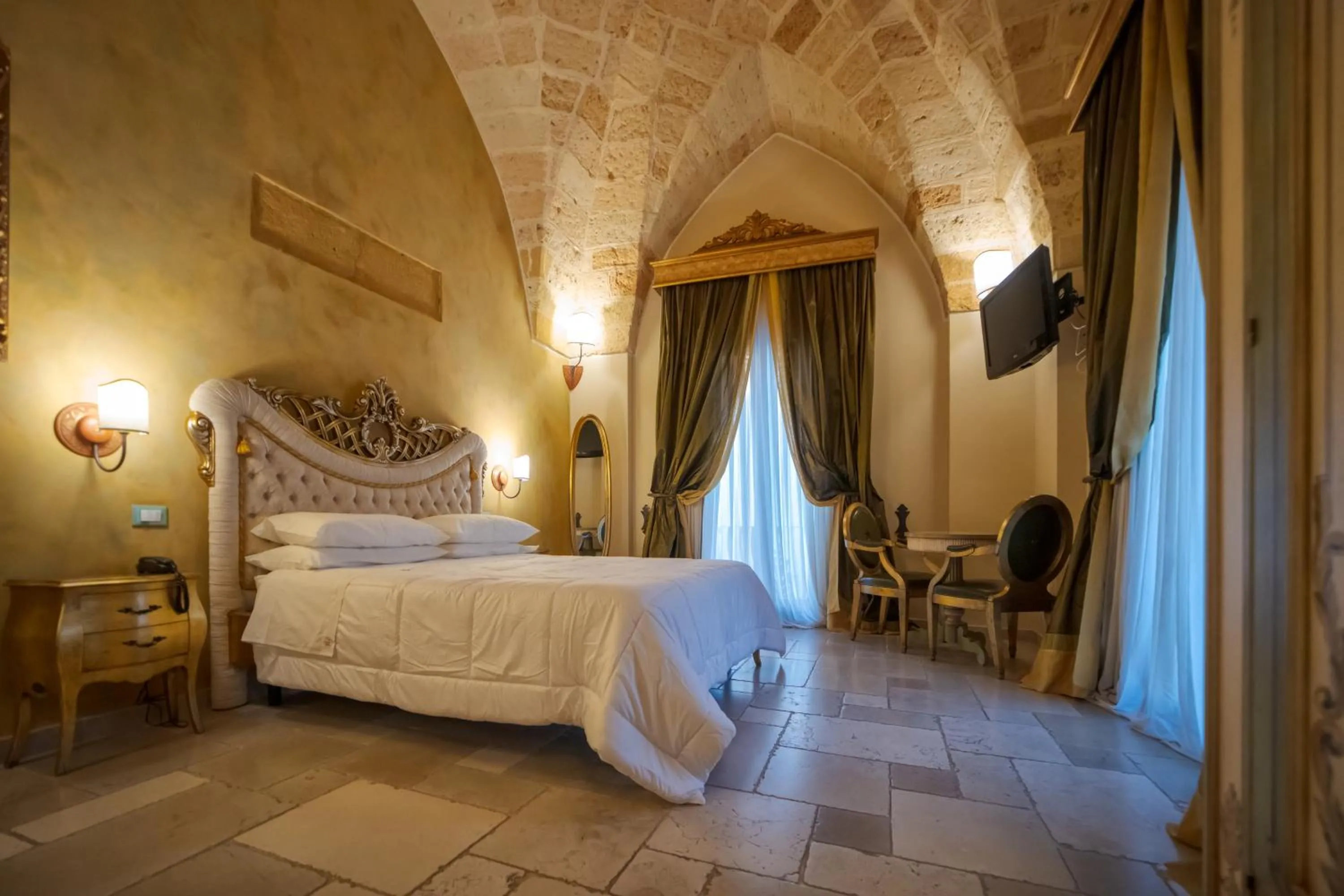 Bedroom in Kelina Charme Hotel by Cantine Due Palme