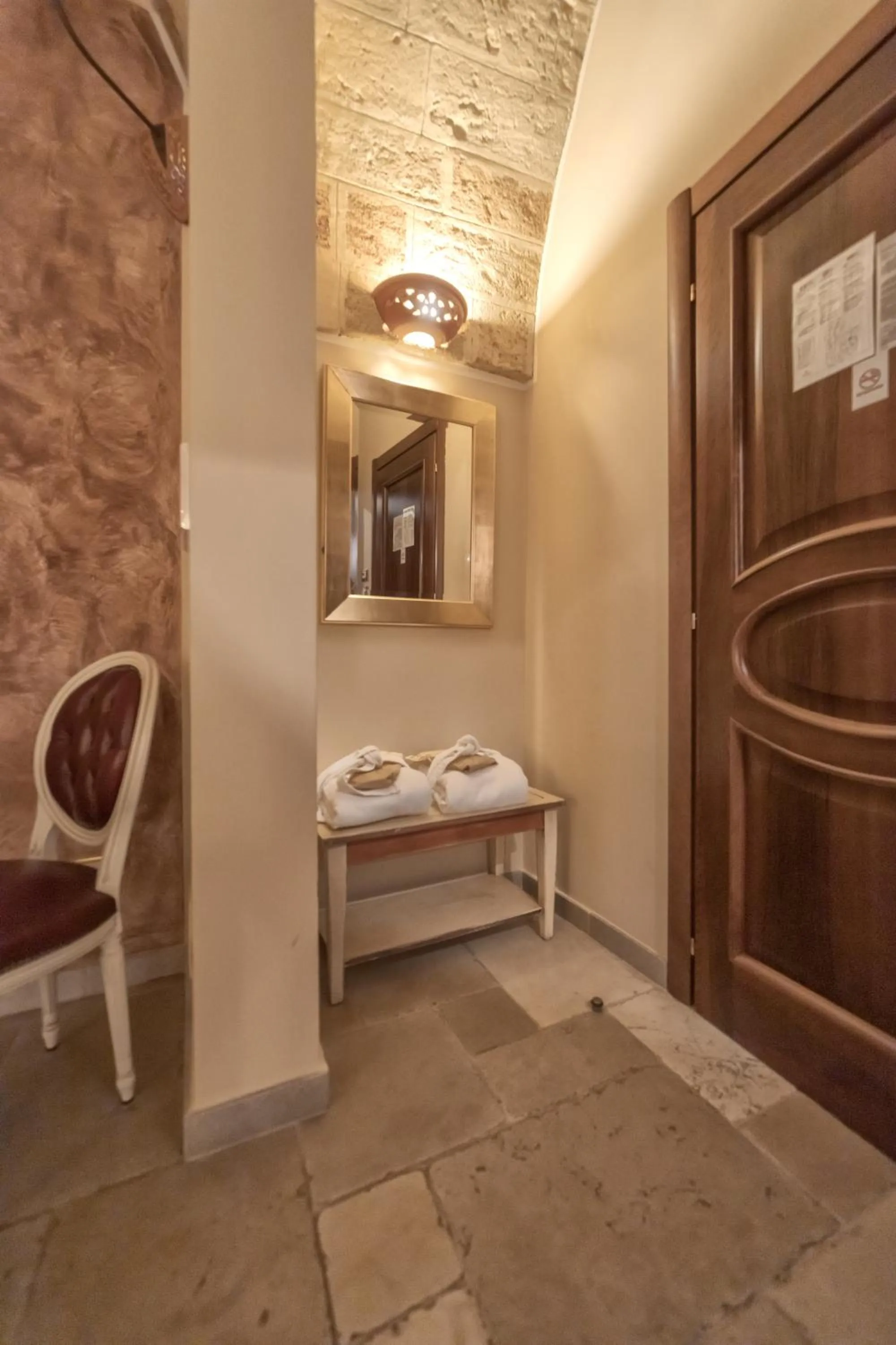 Bedroom in Kelina Charme Hotel by Cantine Due Palme