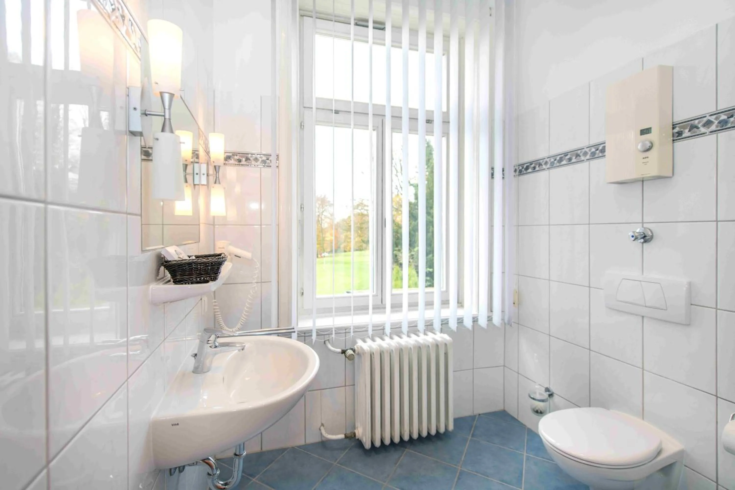 Bathroom in Golfhotel Denzerheide