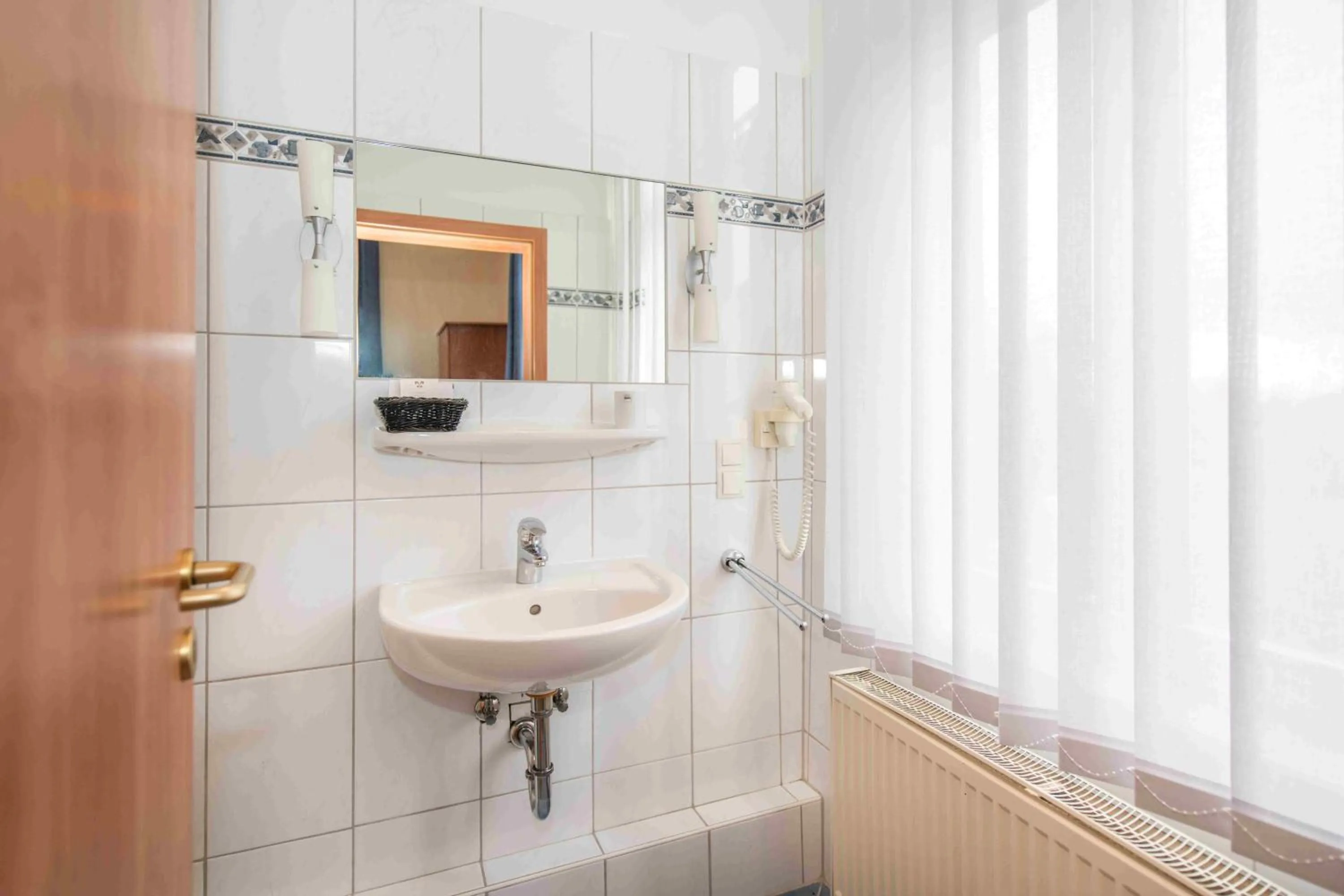 Bathroom in Golfhotel Denzerheide