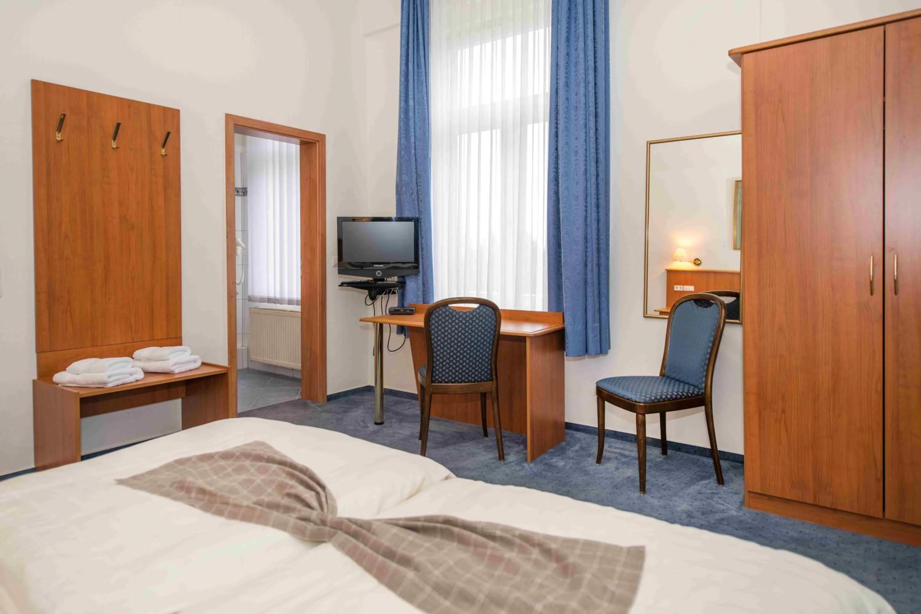 Photo of the whole room, Bed in Golfhotel Denzerheide