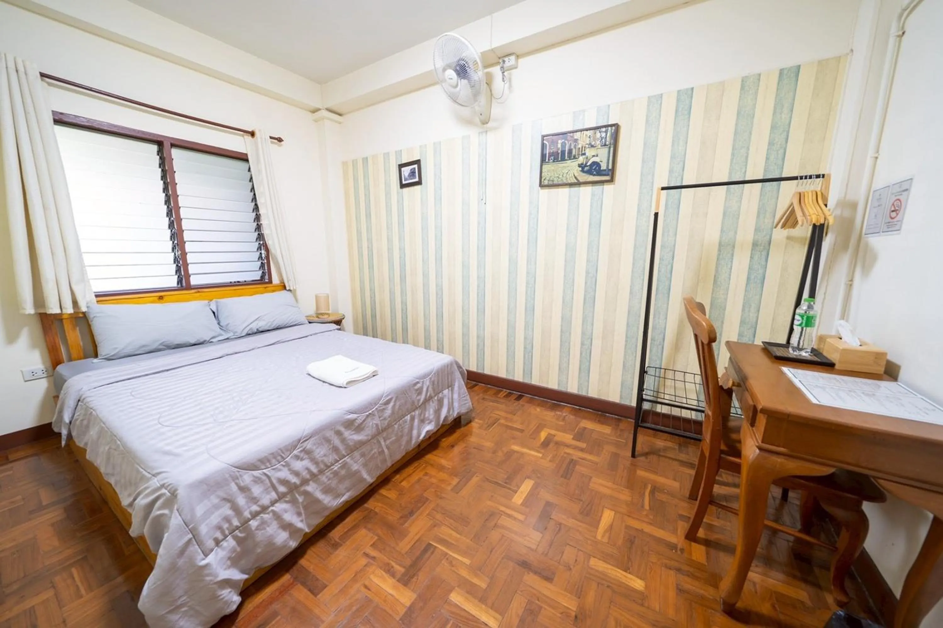 Bed in Koenji Guest House & Bar Chiang Mai