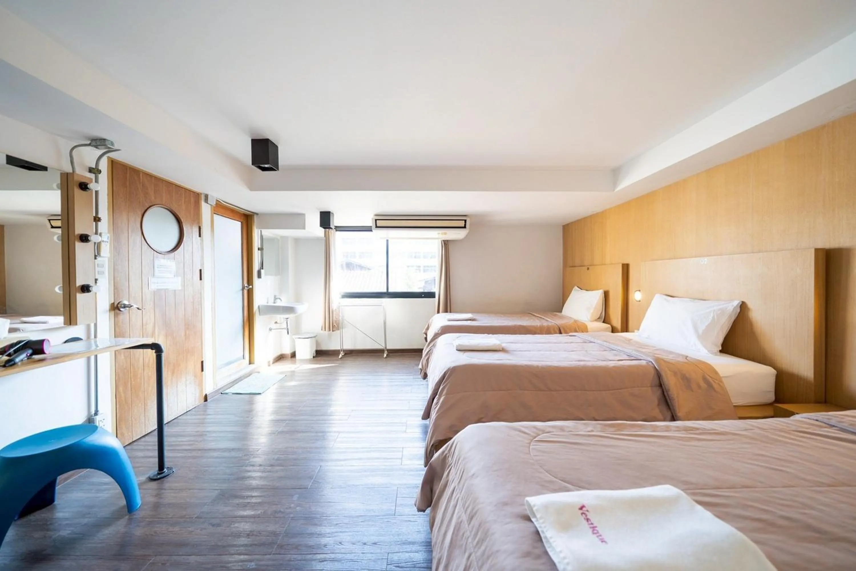 Bed in Koenji Guest House & Bar Chiang Mai