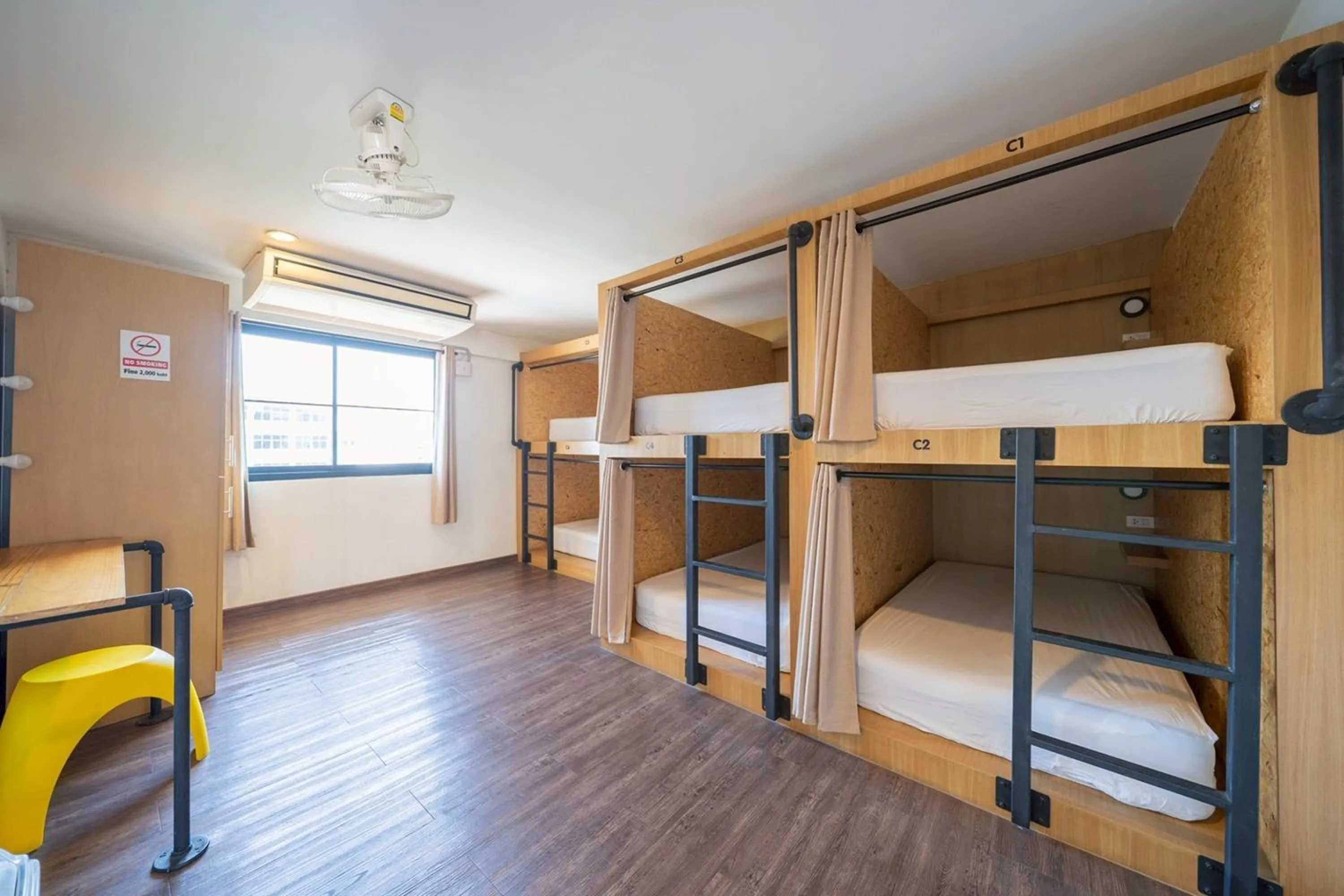 Bed in Koenji Guest House & Bar Chiang Mai