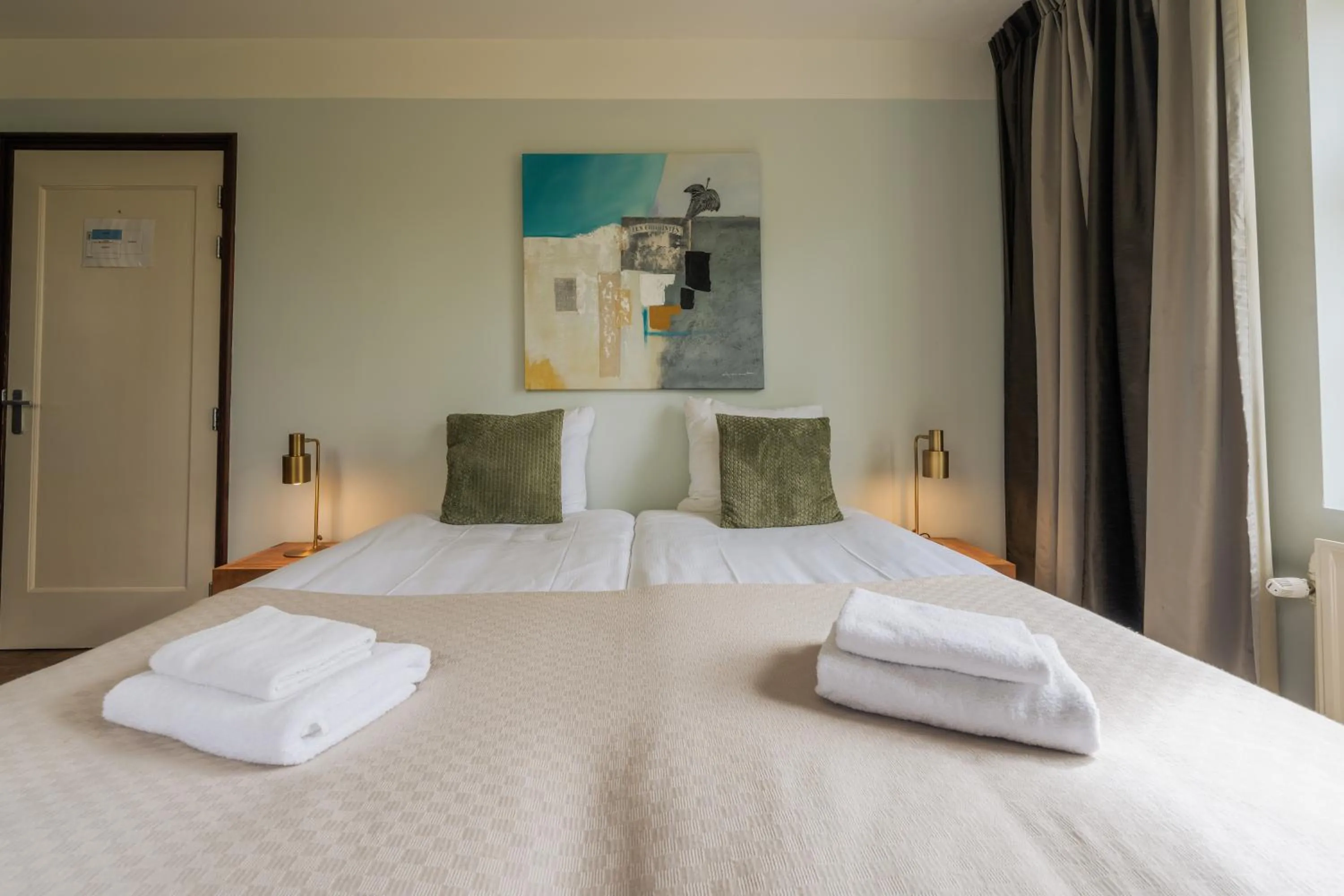 Bed in Strandhotel Dennenbos