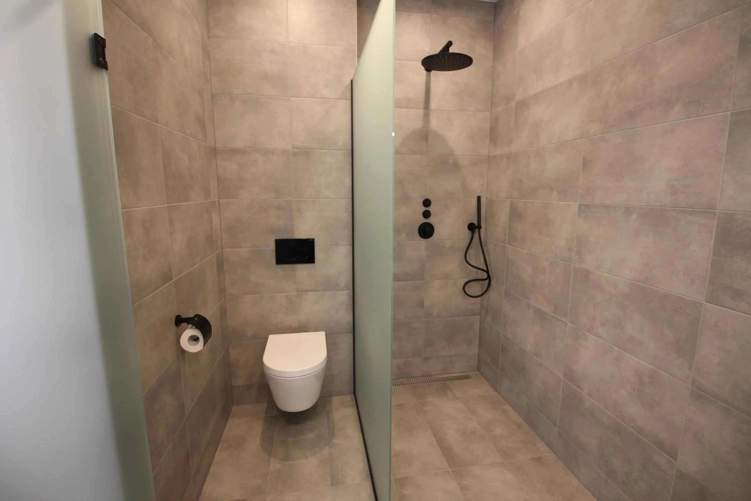 Shower in Strandhotel Dennenbos