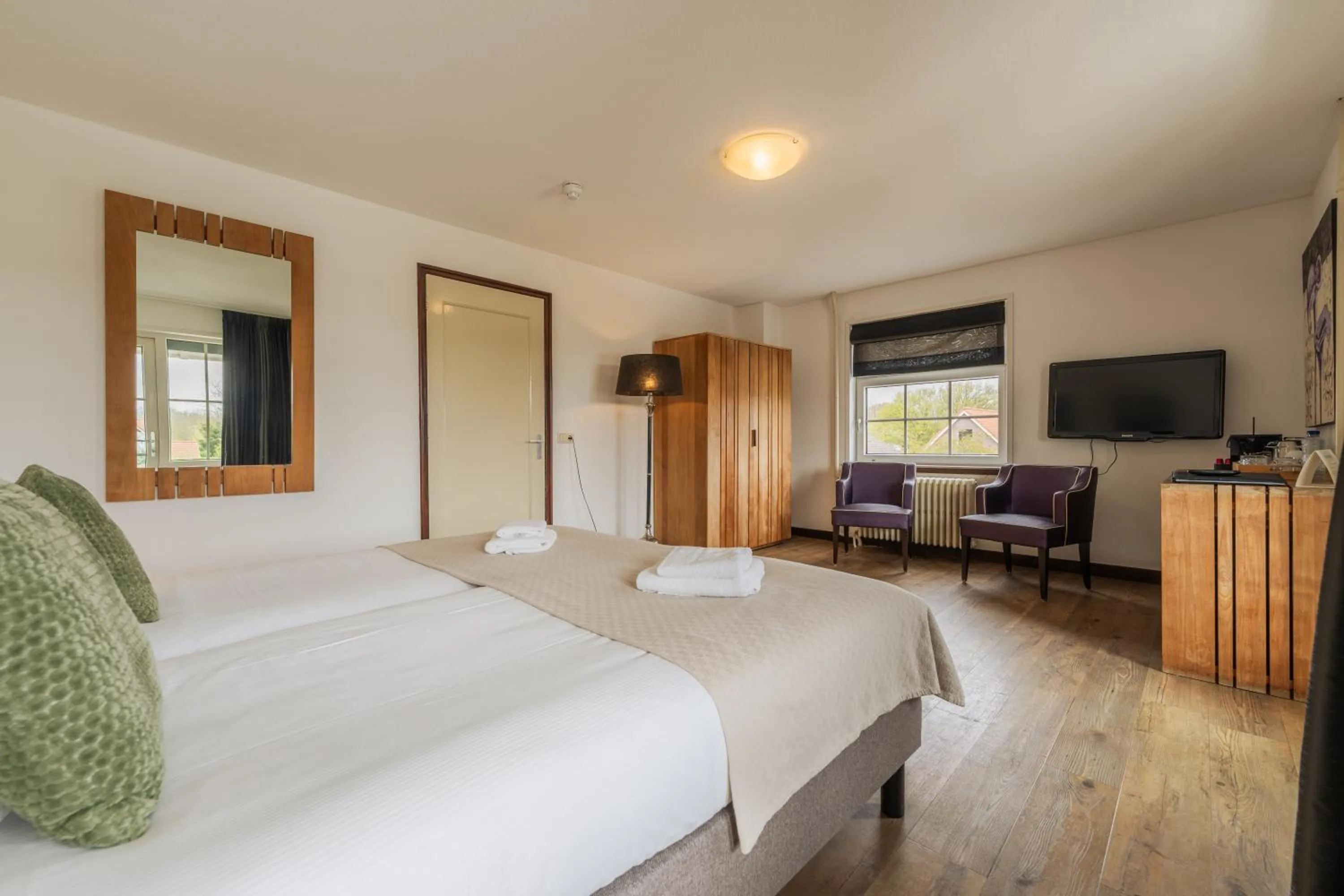 Bed in Strandhotel Dennenbos