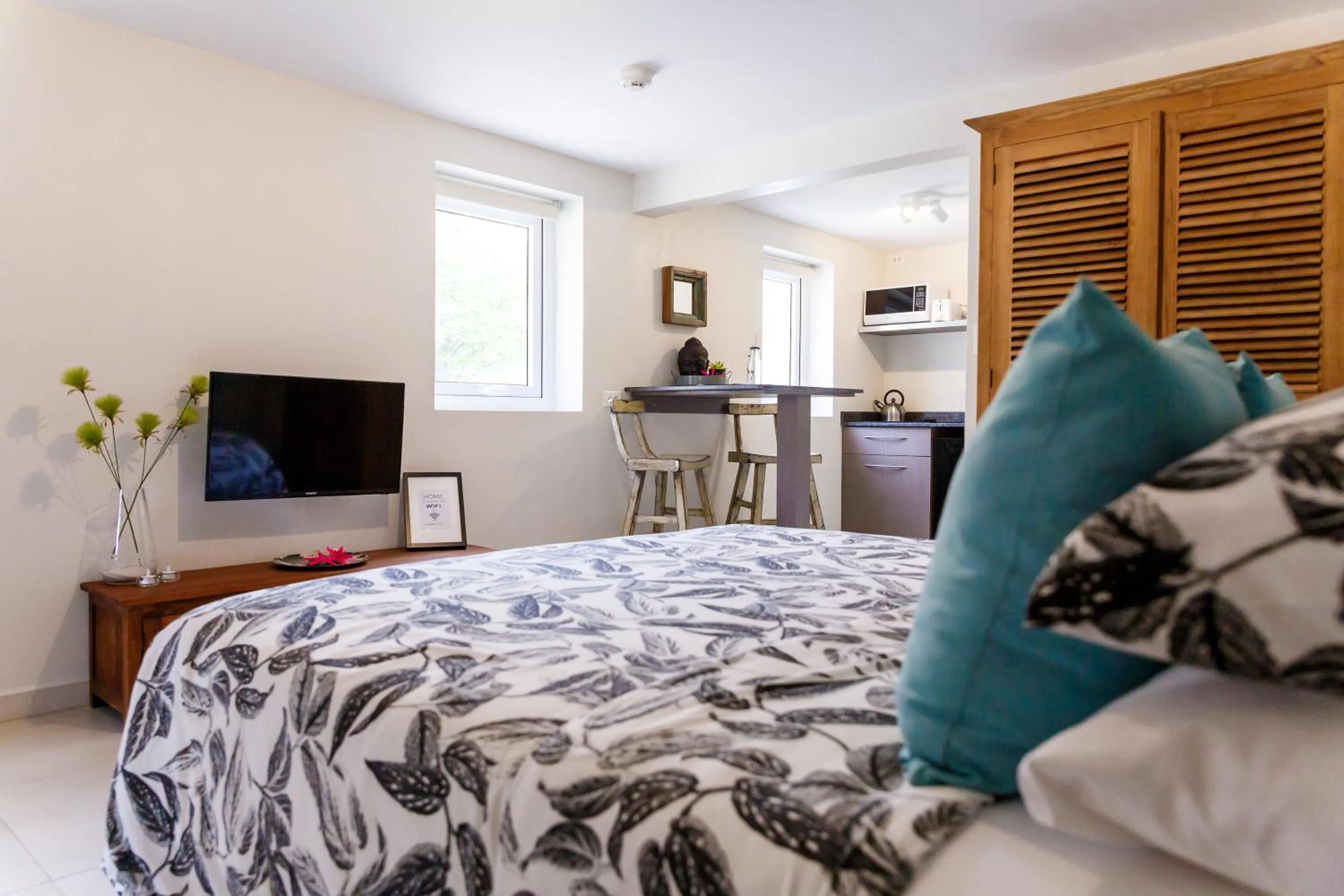 Bed in Aruba Boutique Apartments - Adults Only