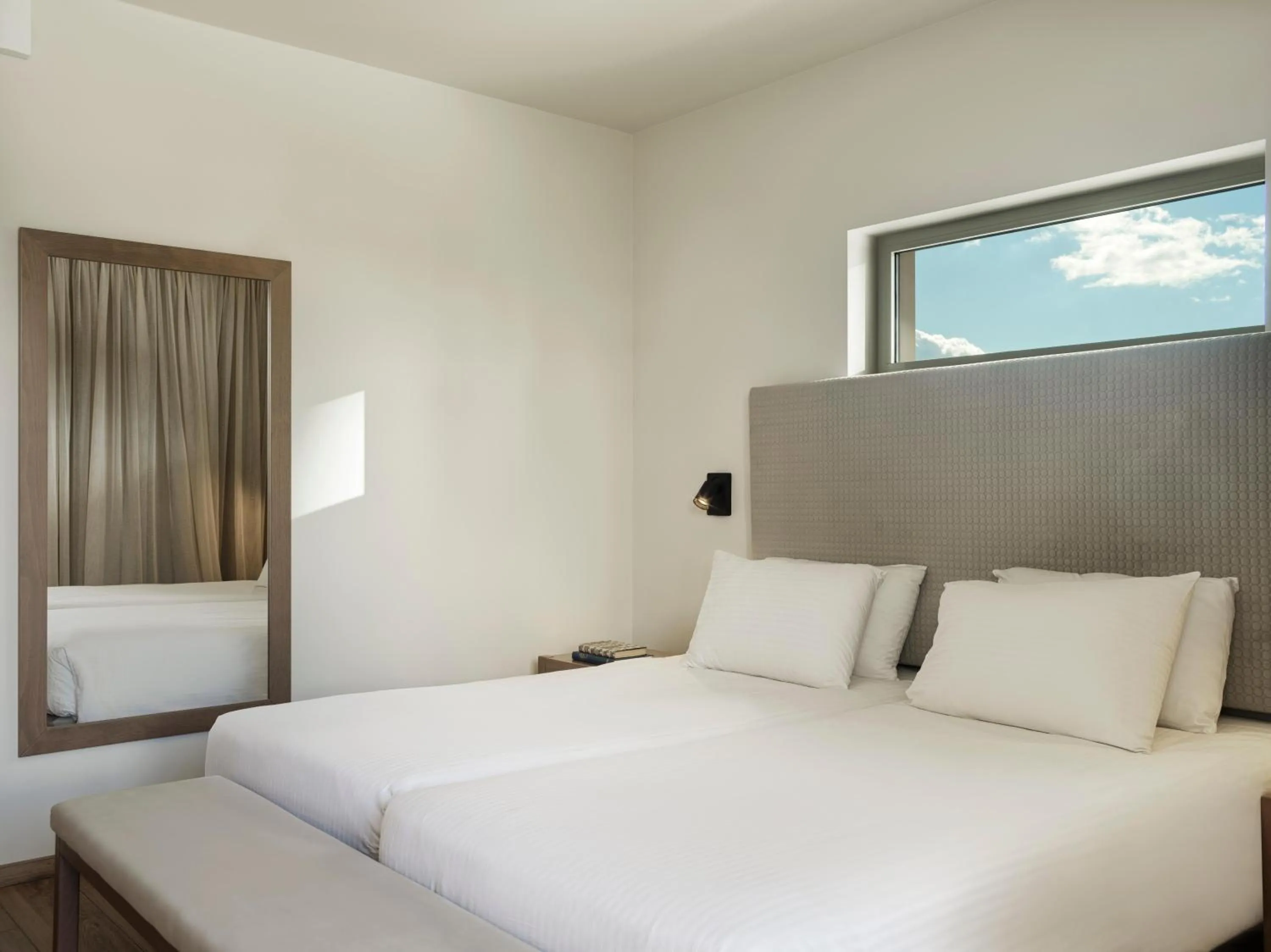 Bed in Civitel Attik Rooms & Suites