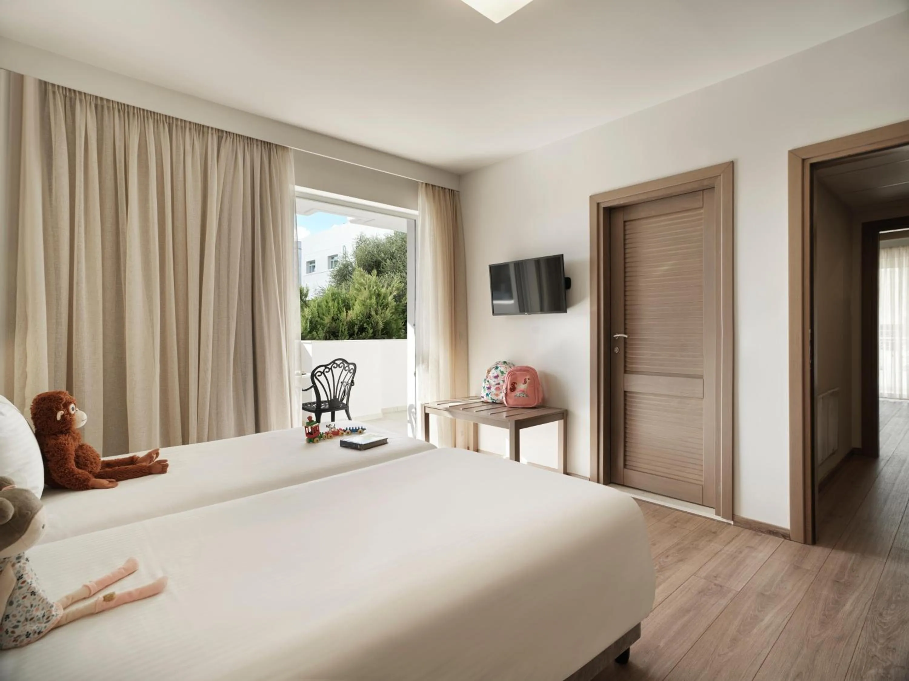 Bed in Civitel Attik Rooms & Suites