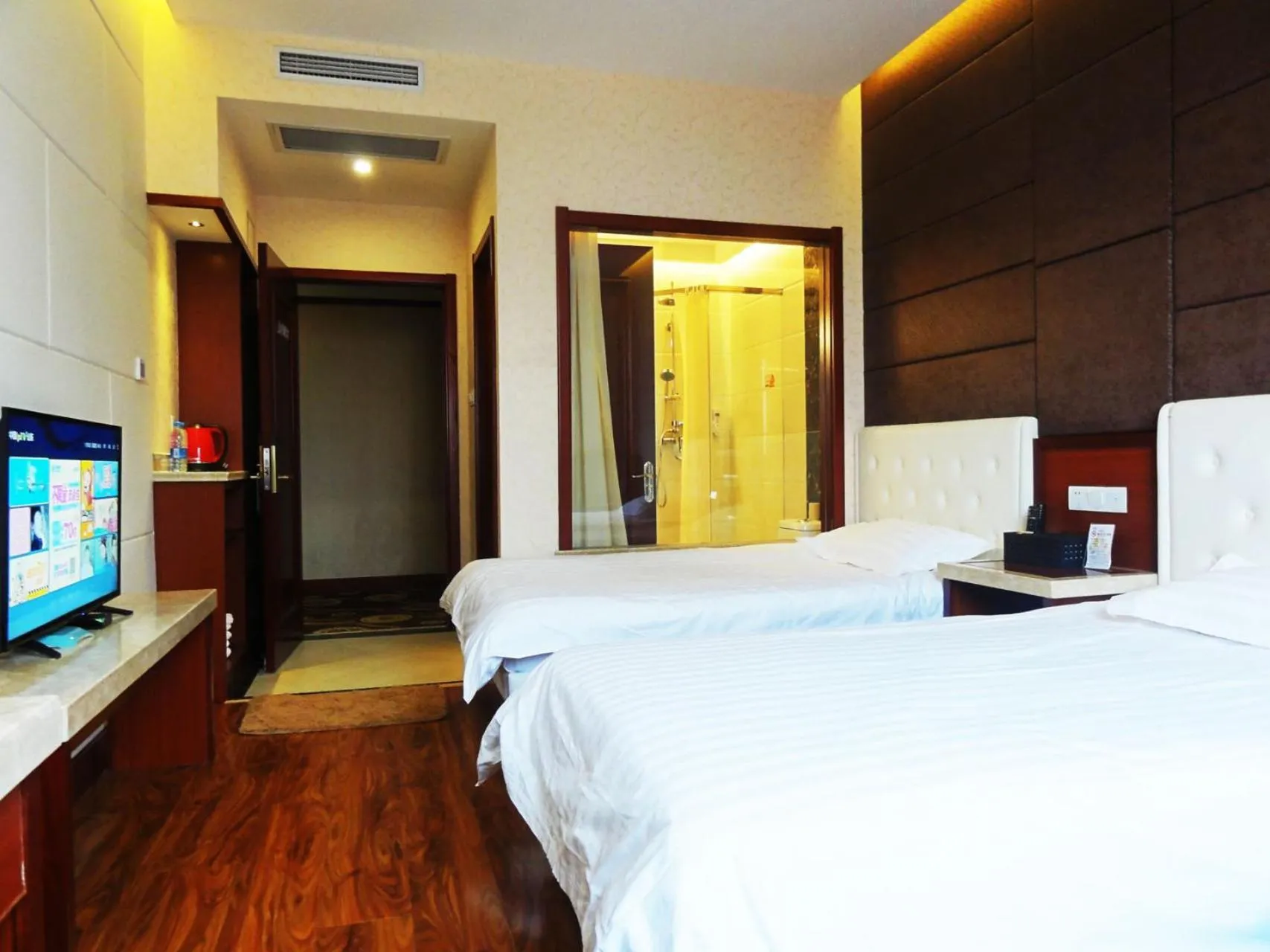 Bed in Hua Qi Kaiserdom Hotel Zhongshan Road St Michael's Cathedral and Zhanqiao Pier Qingdao