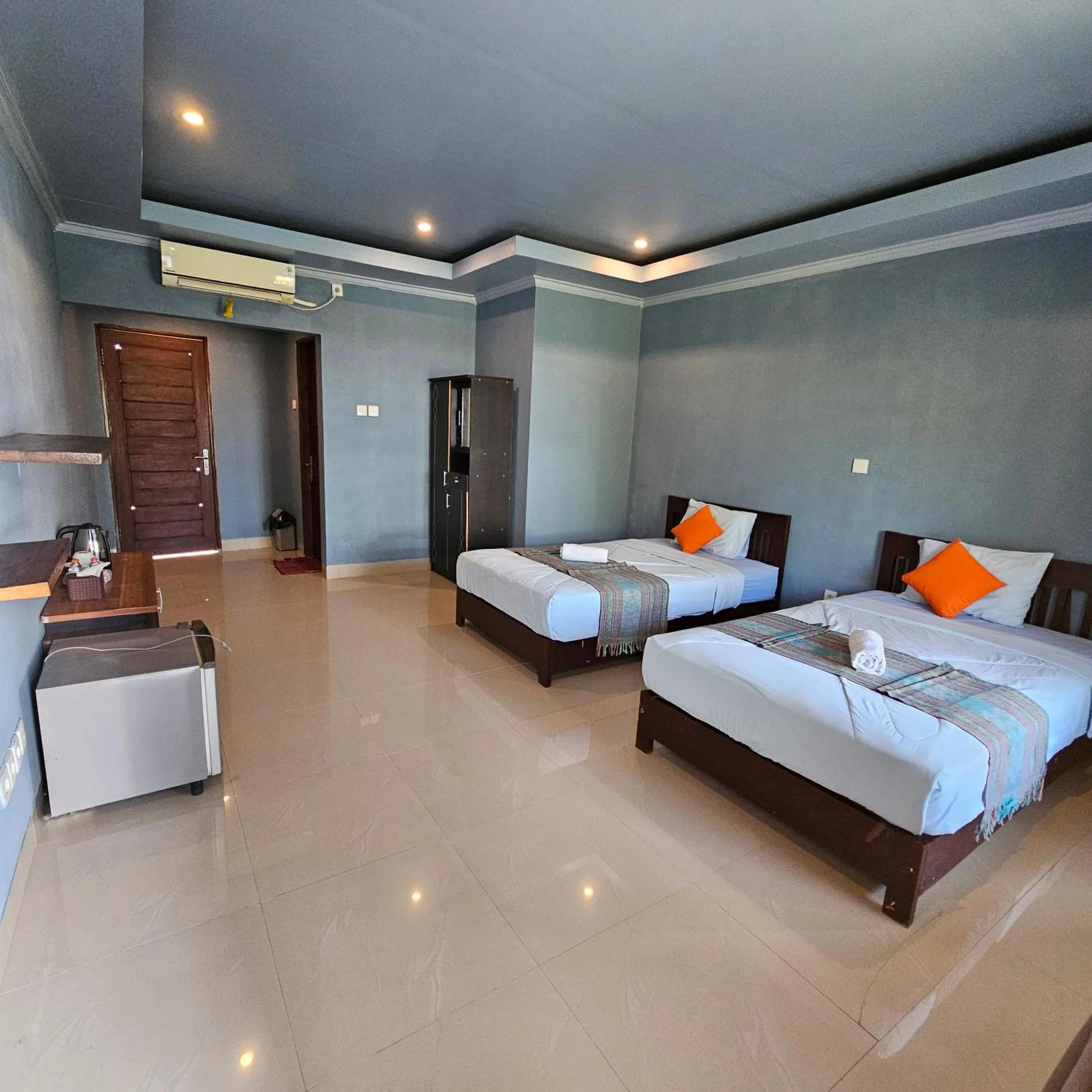 Bed in Ridho Malik Hotel