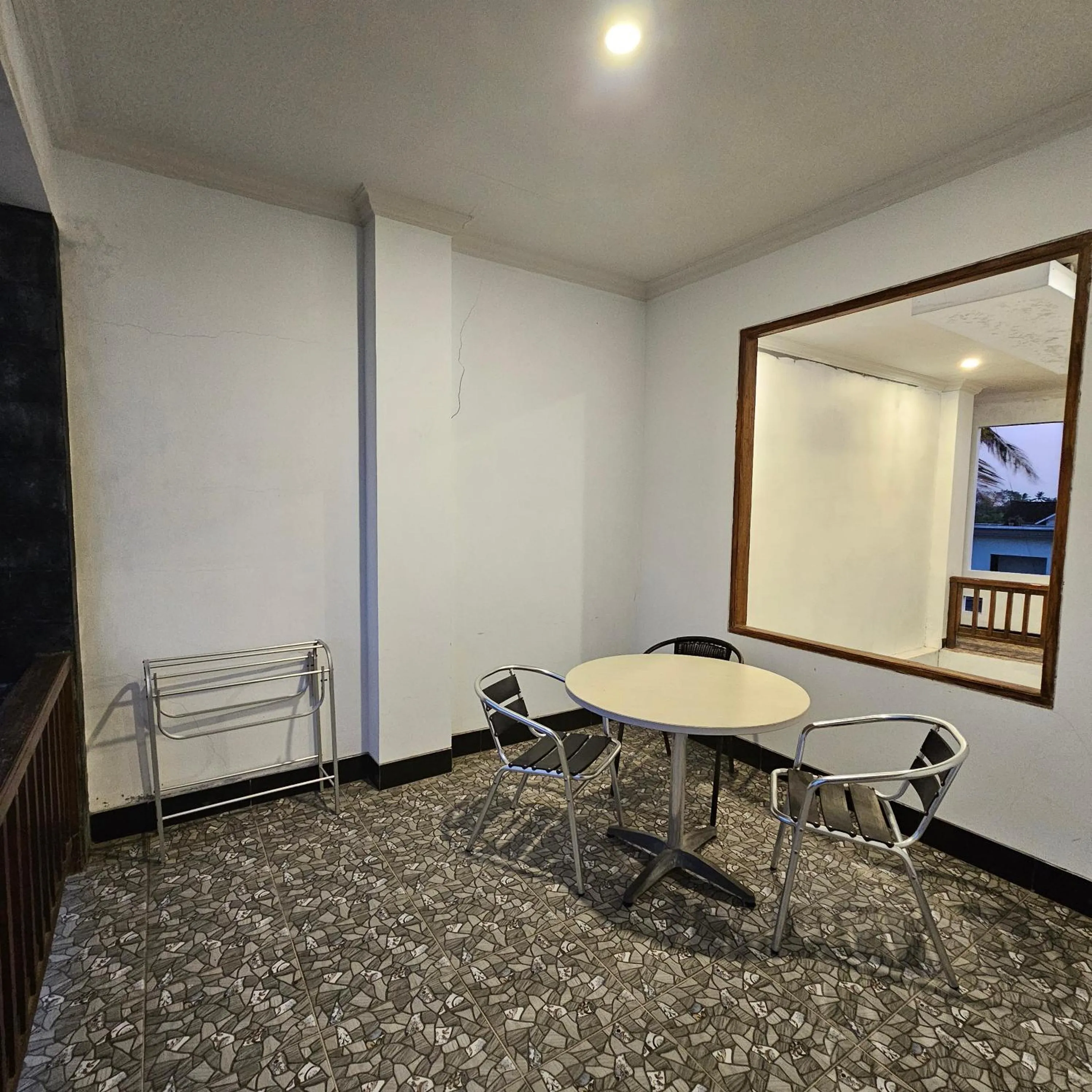 Seating area in Ridho Malik Hotel