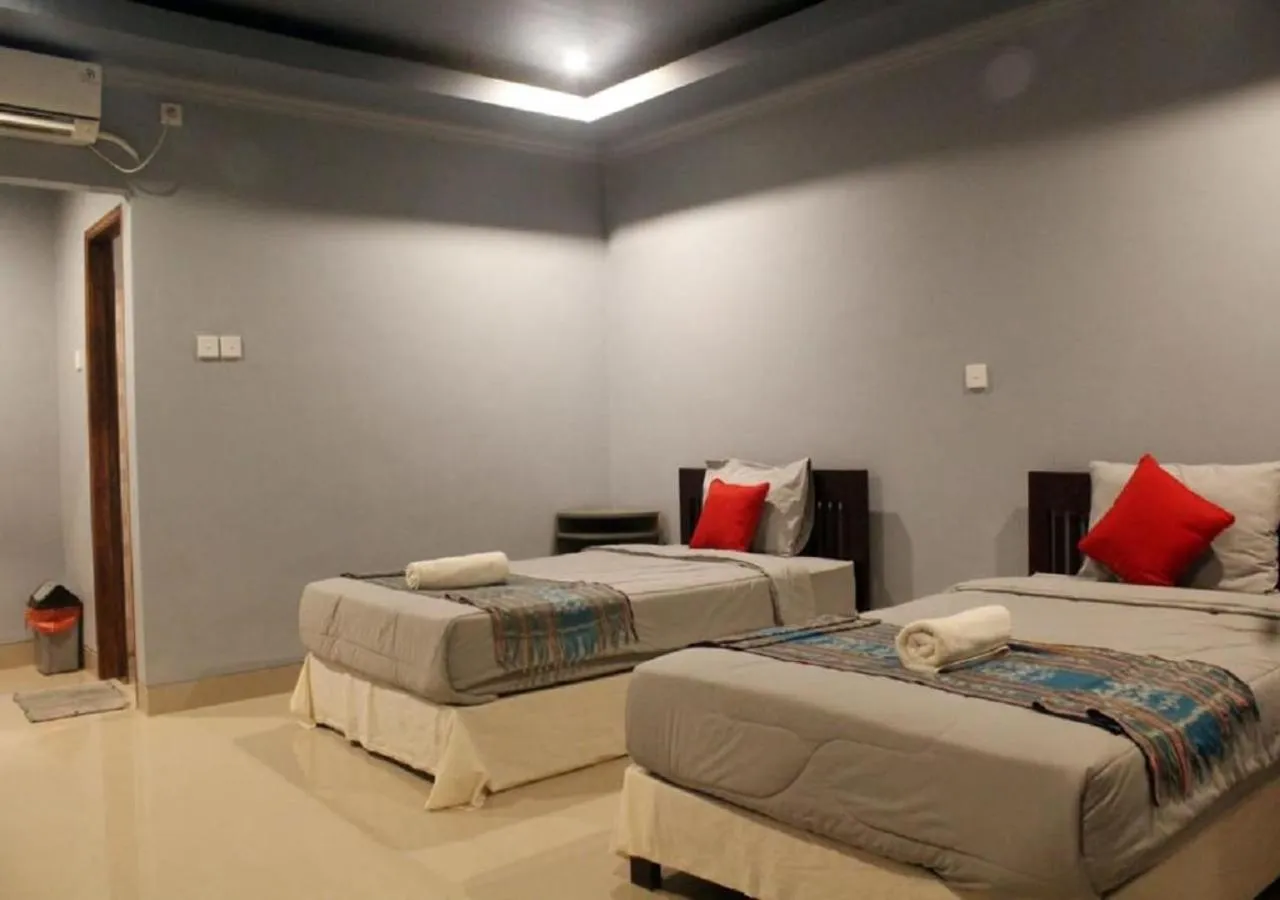 Bed in Ridho Malik Hotel