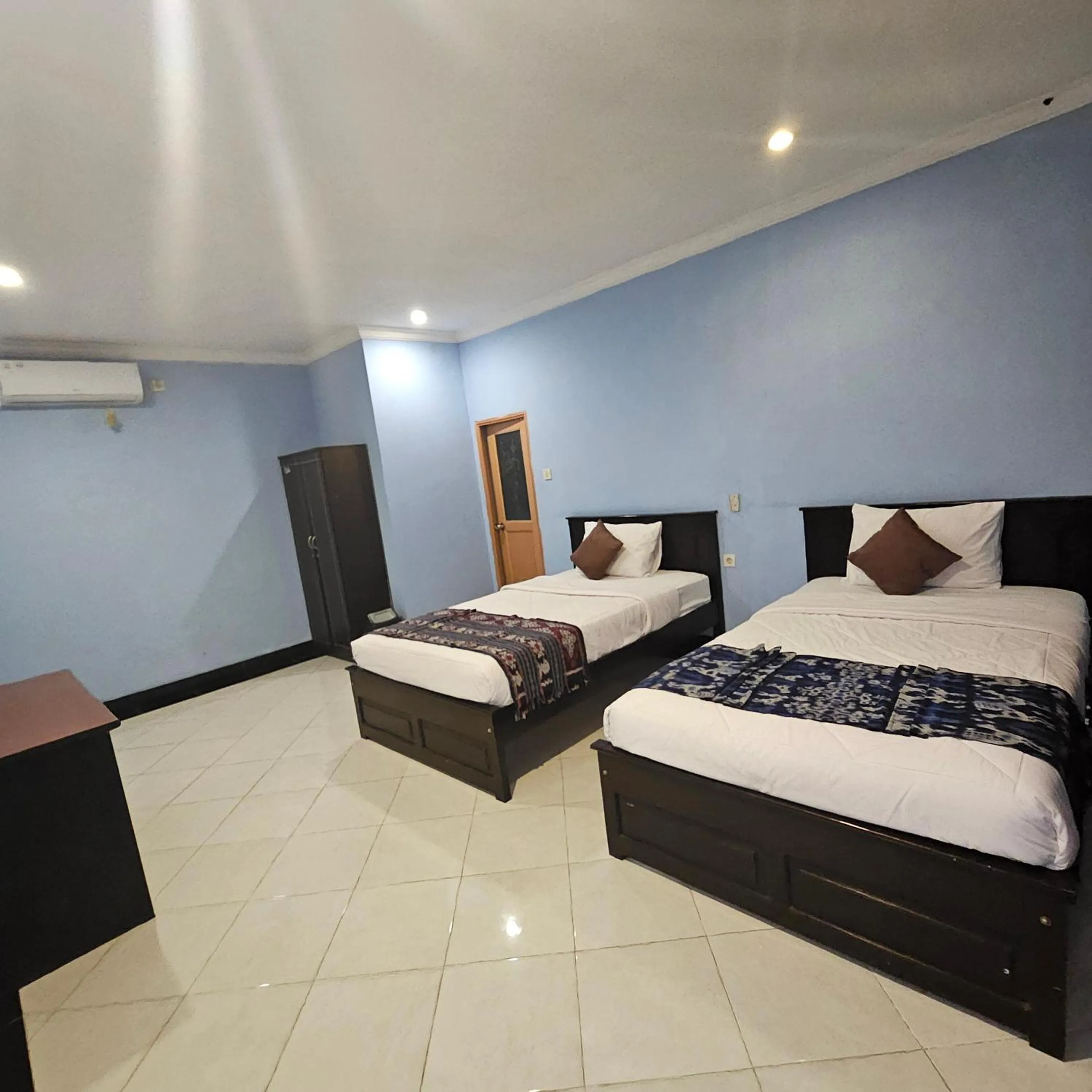 Bed in Ridho Malik Hotel