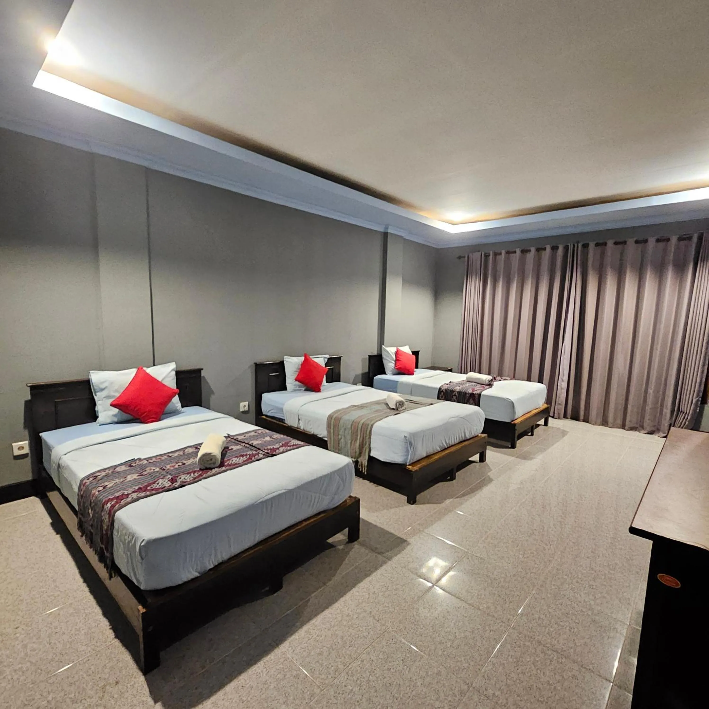 Bed in Ridho Malik Hotel