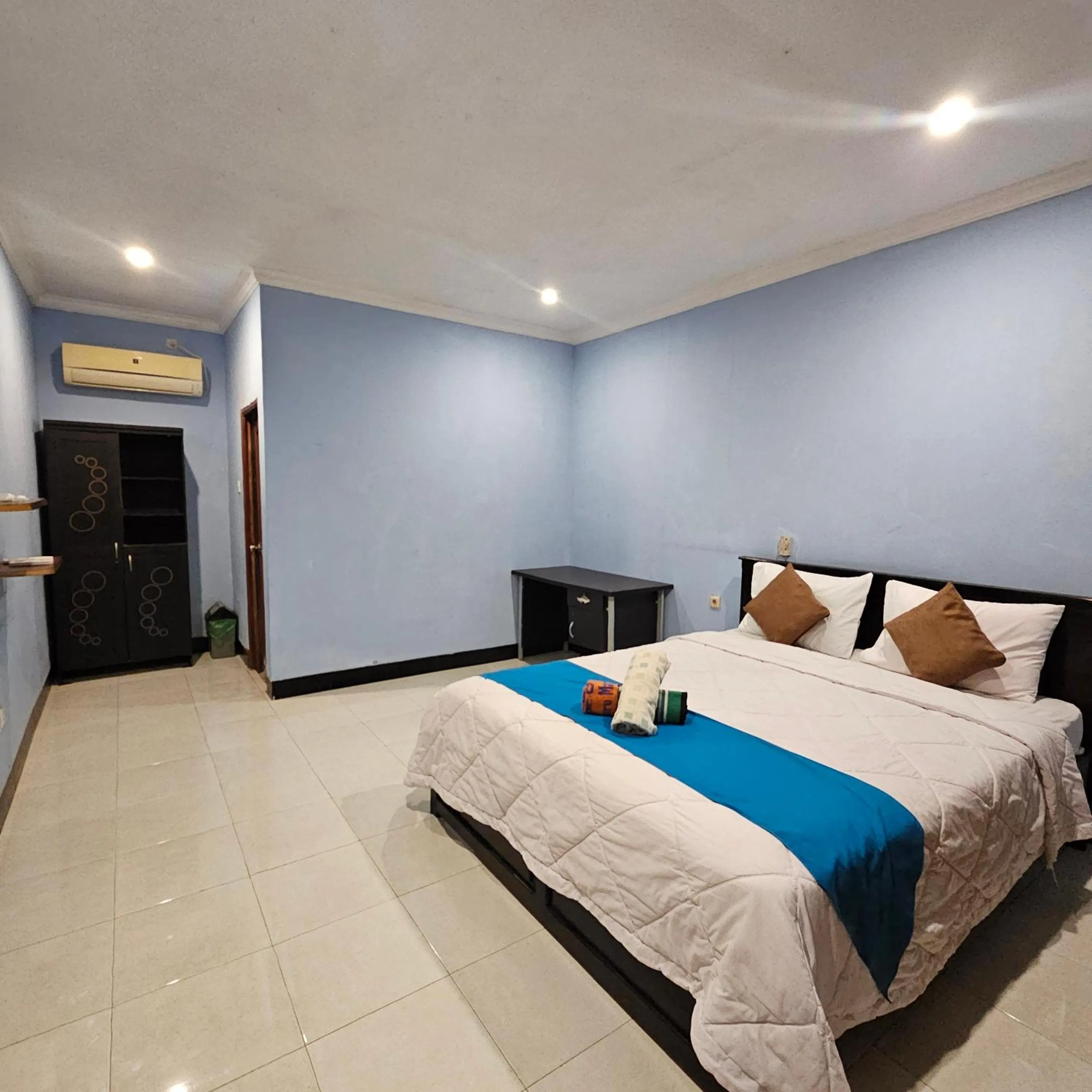 Bed in Ridho Malik Hotel