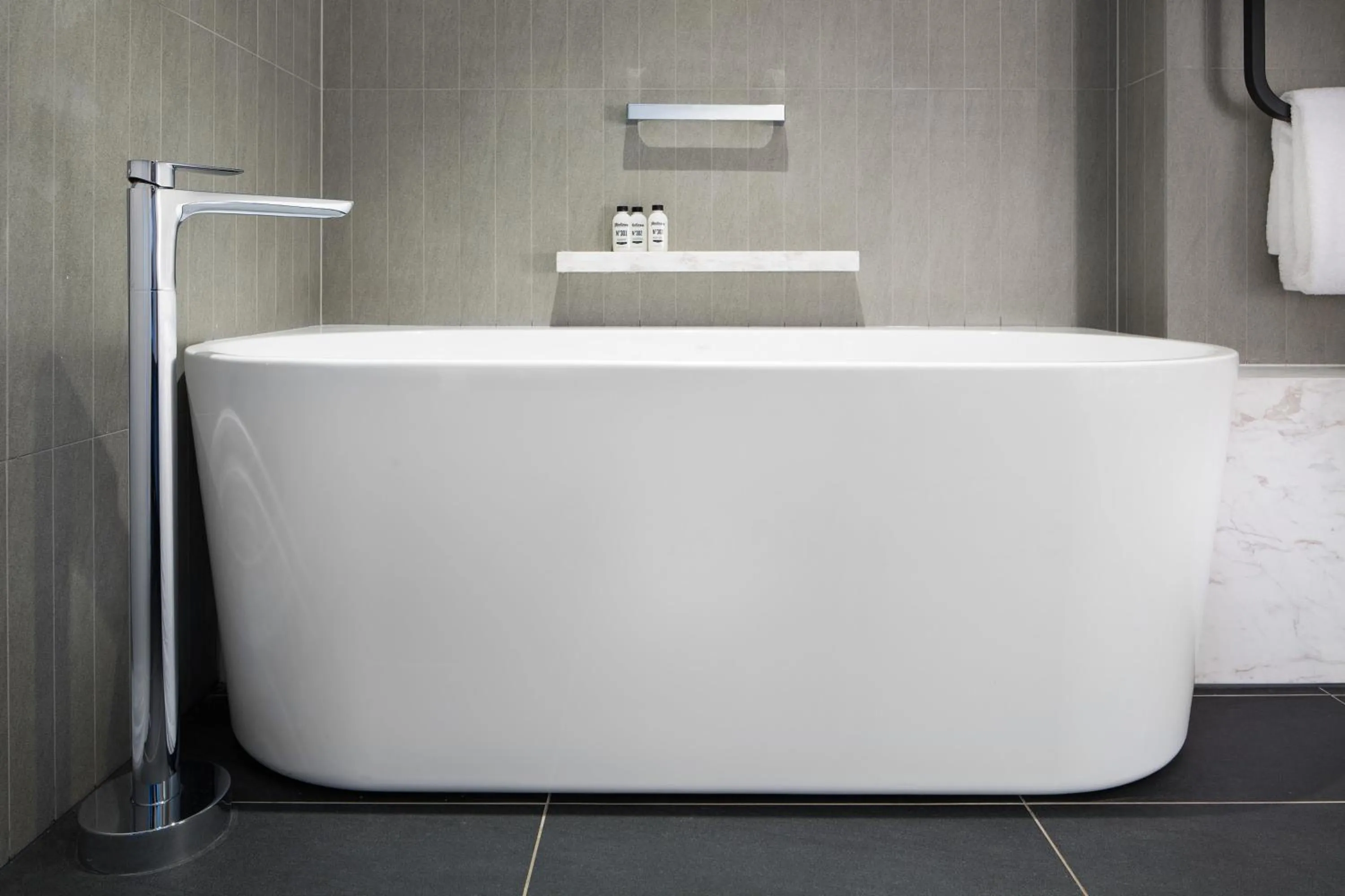 Bath in West Hotel Sydney, Curio Collection by Hilton