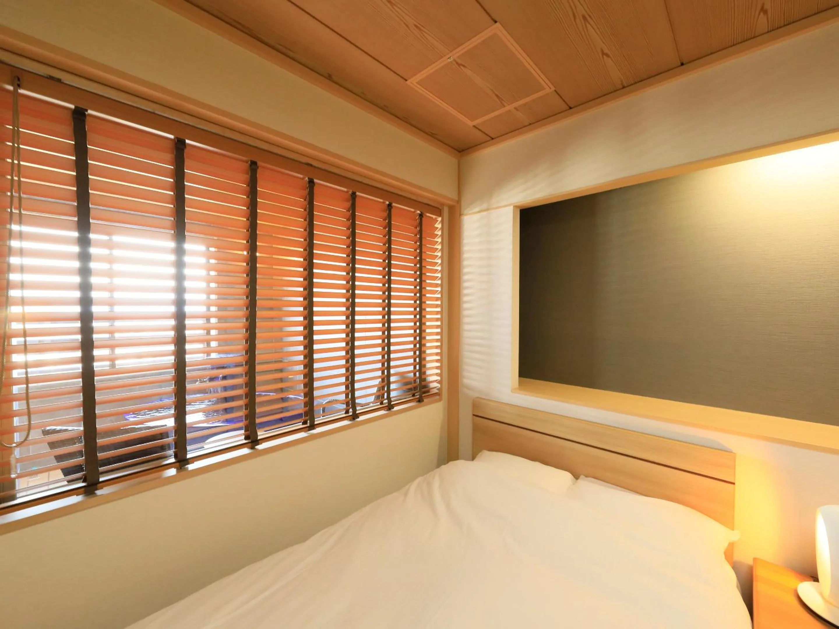 Bed in Hotel Tsubakino