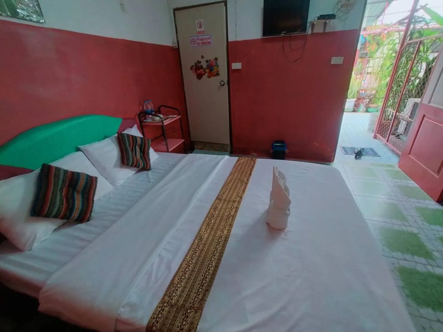 Bed in Sabaydee House at Pai