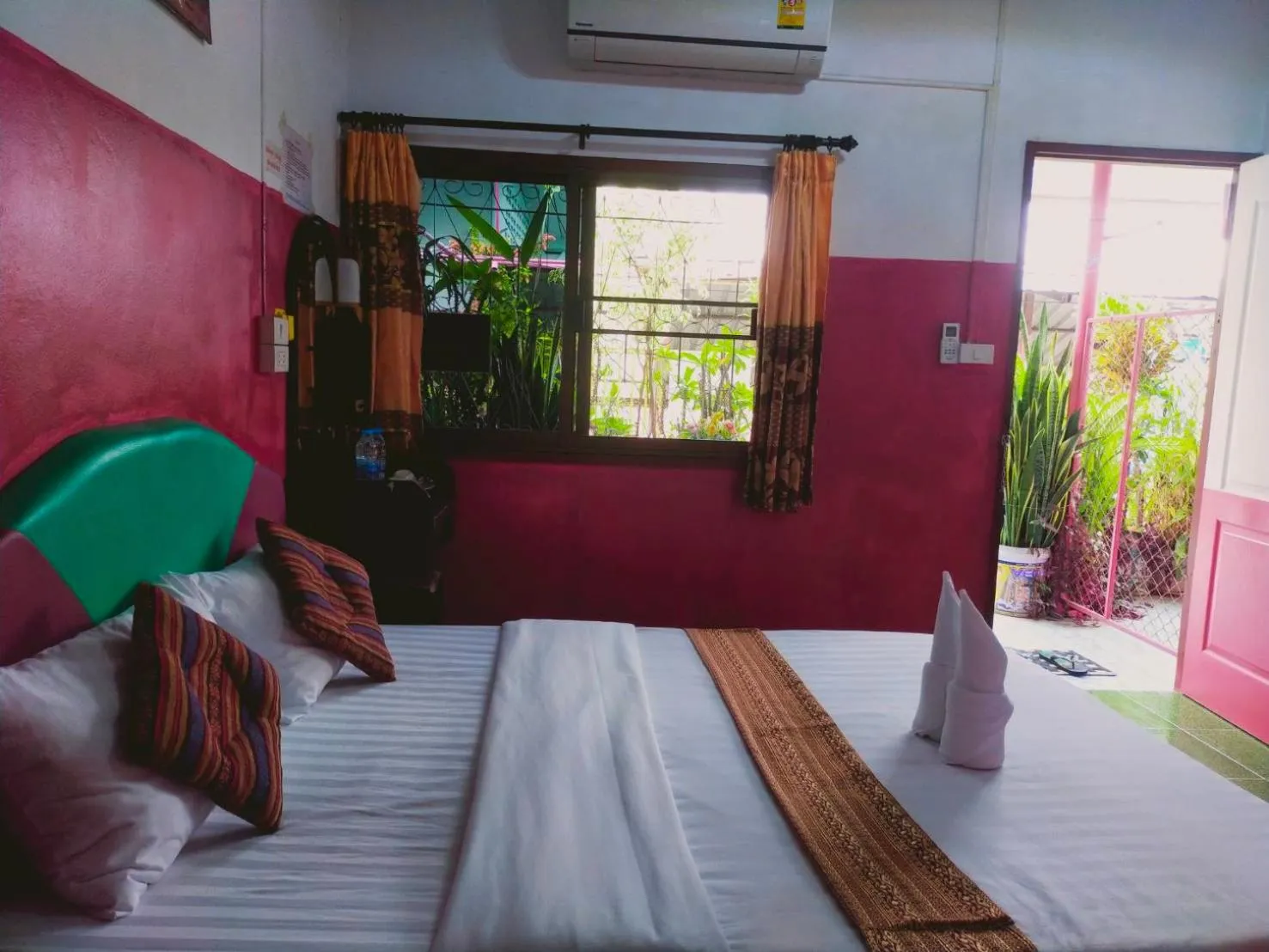 Bed in Sabaydee House at Pai