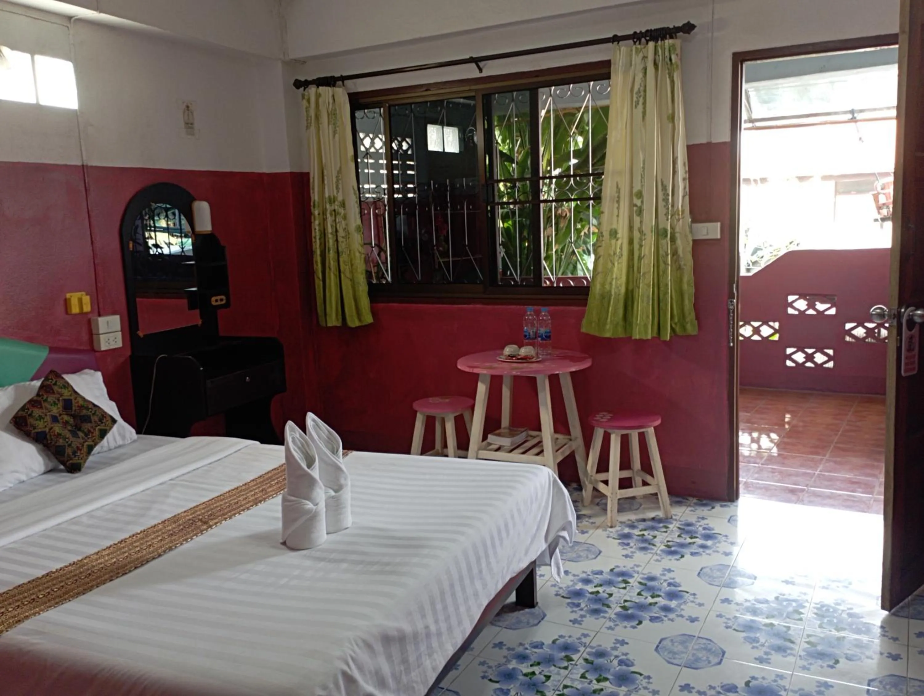 Bed in Sabaydee House at Pai