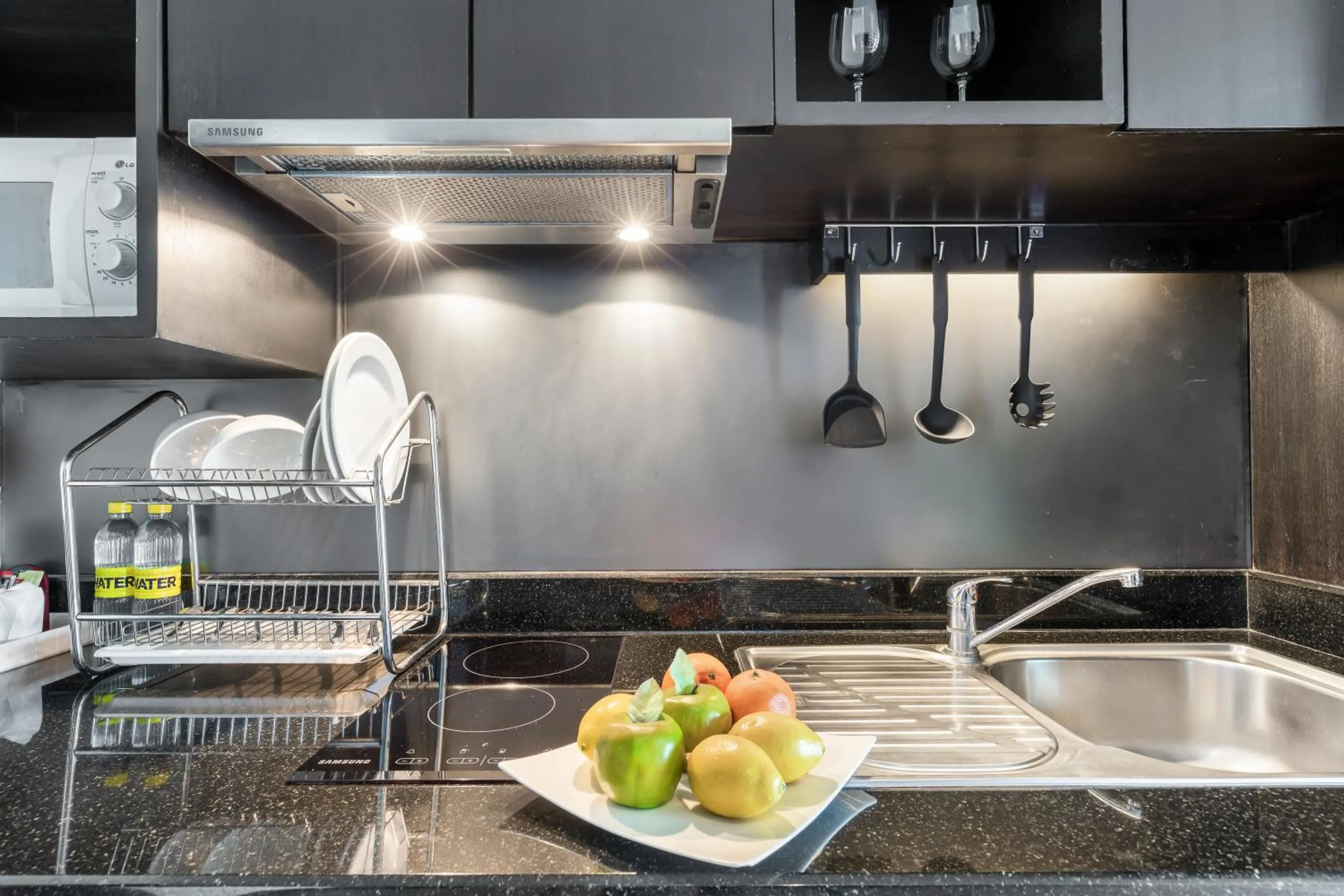 Kitchen or kitchenette in Golden Tulip Mandison Suites