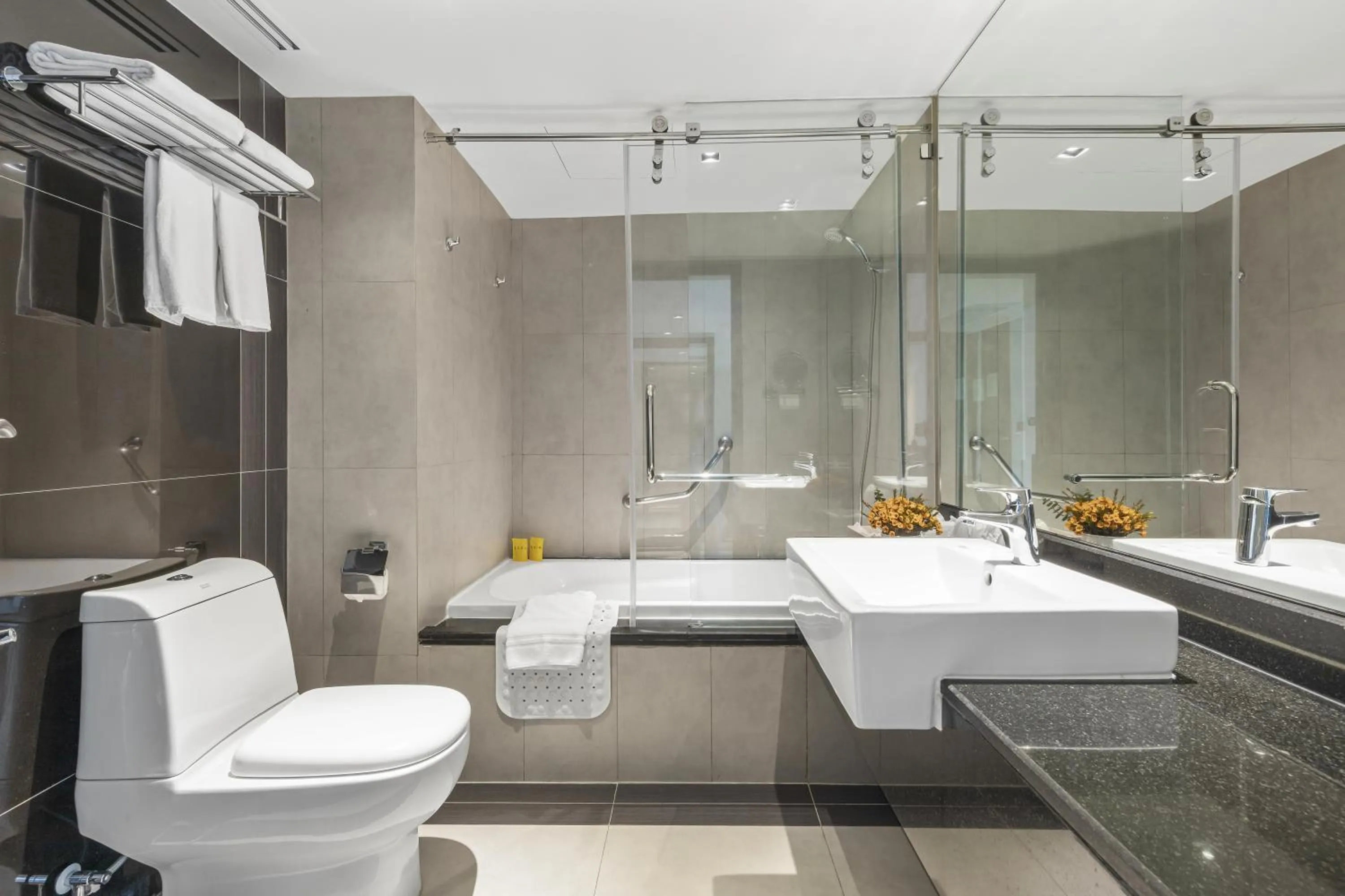 Toilet in Golden Tulip Mandison Suites