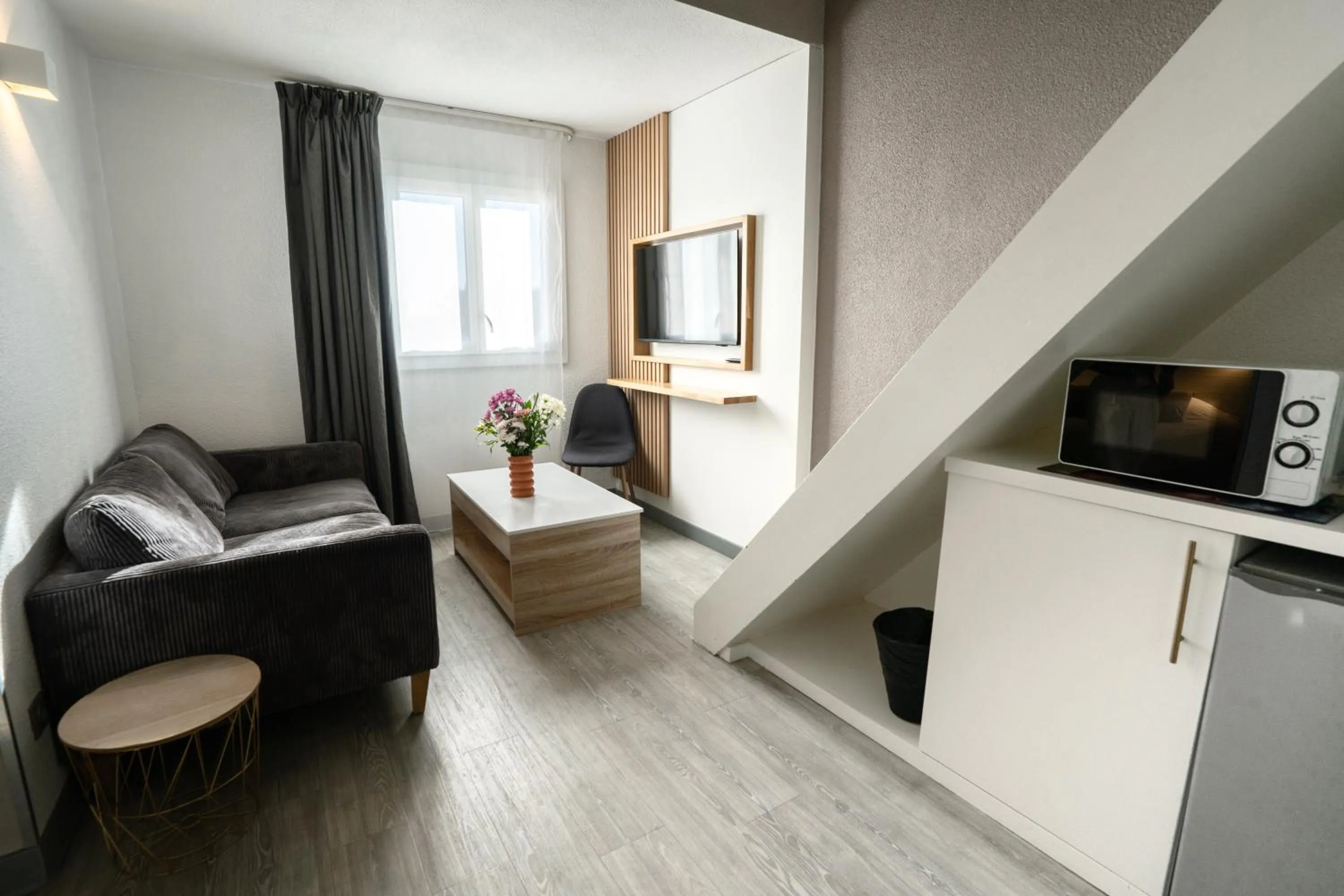 Living room in Kyriad Montpellier Sud - A709