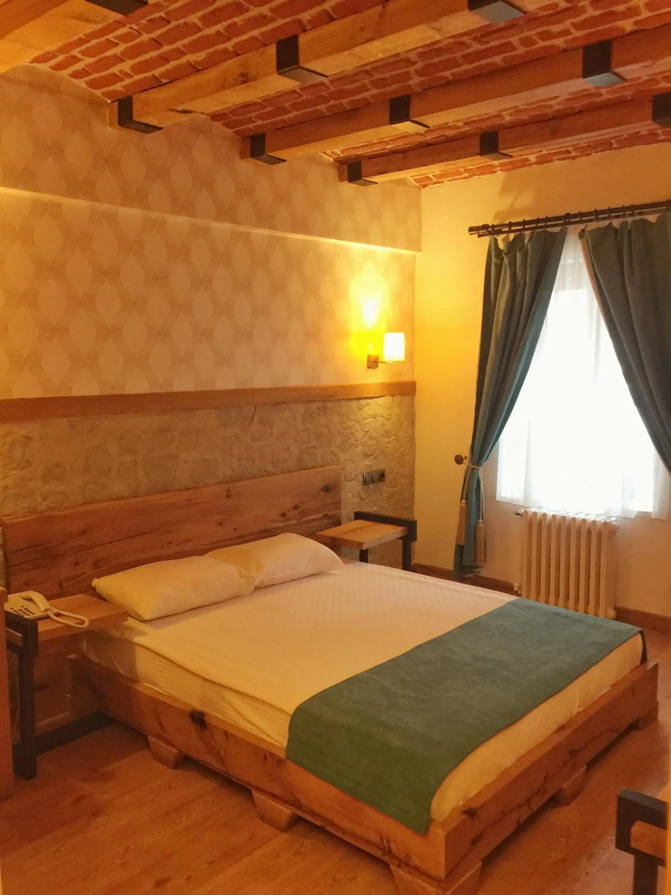 Bed in Assos Kervansaray Hotel - Special Category