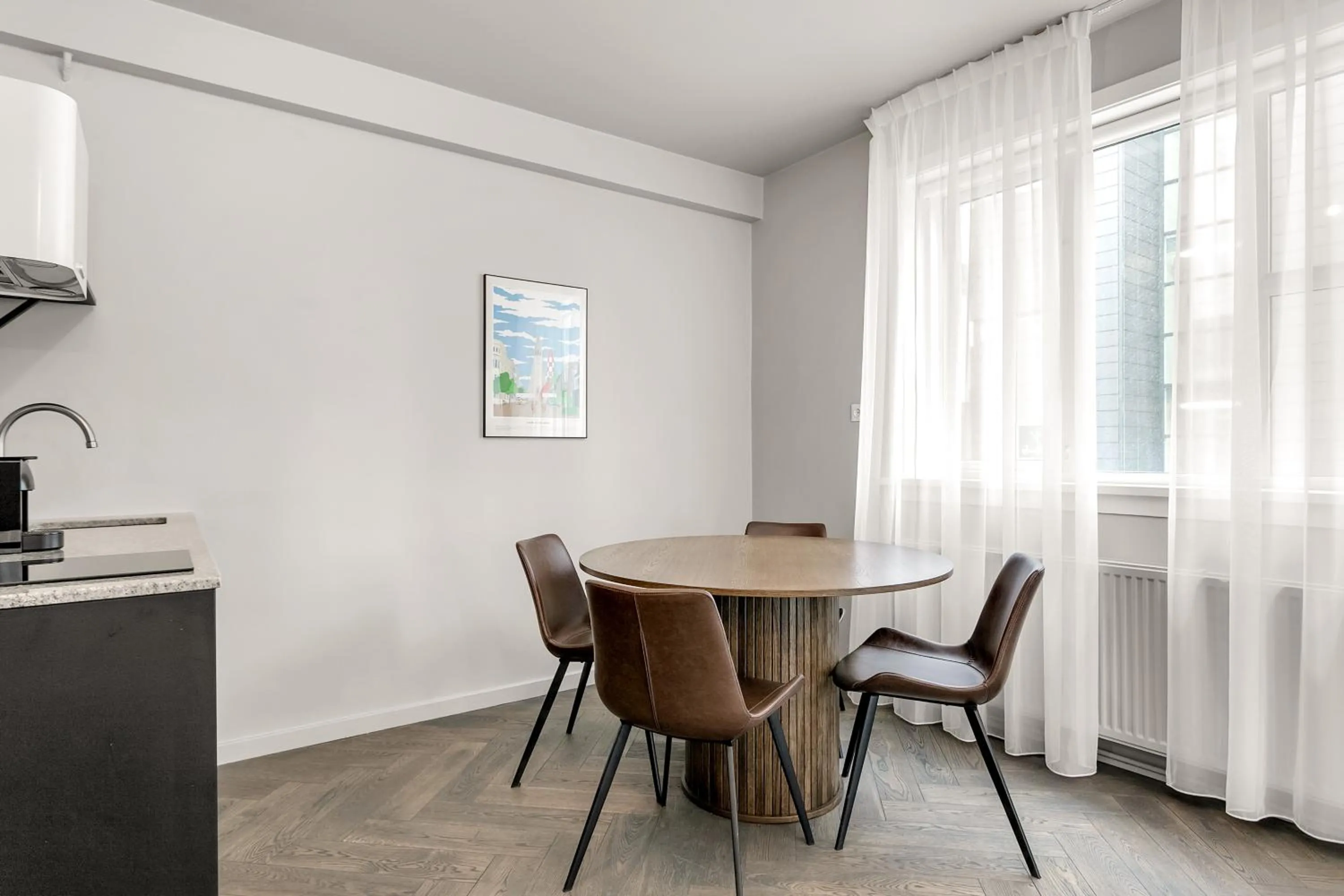Kitchen or kitchenette in The Swan House by Heimaleiga