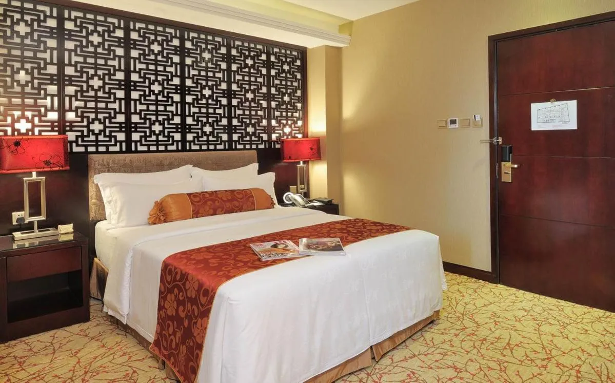 Bed in Hotel Metropole