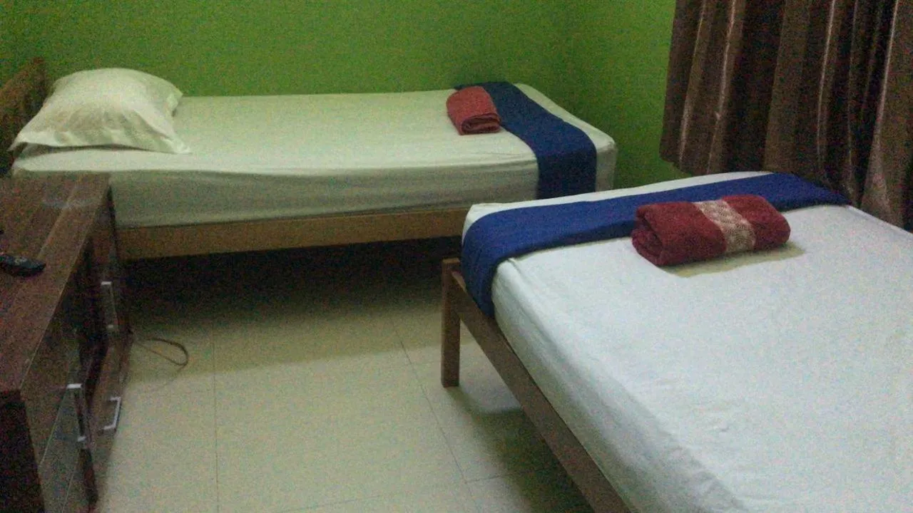 Bed in Aini Home Stay