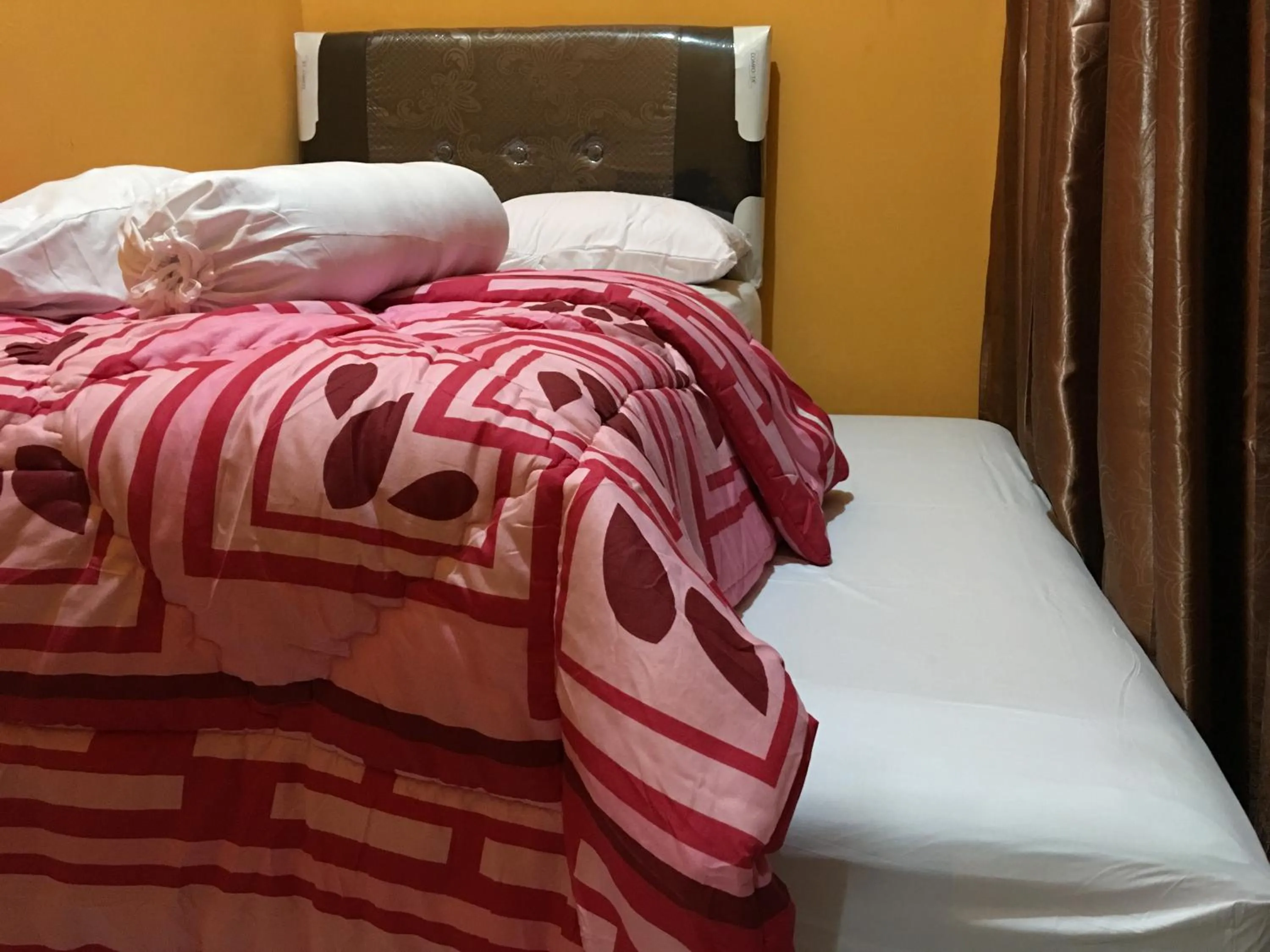 Bed in Aini Home Stay