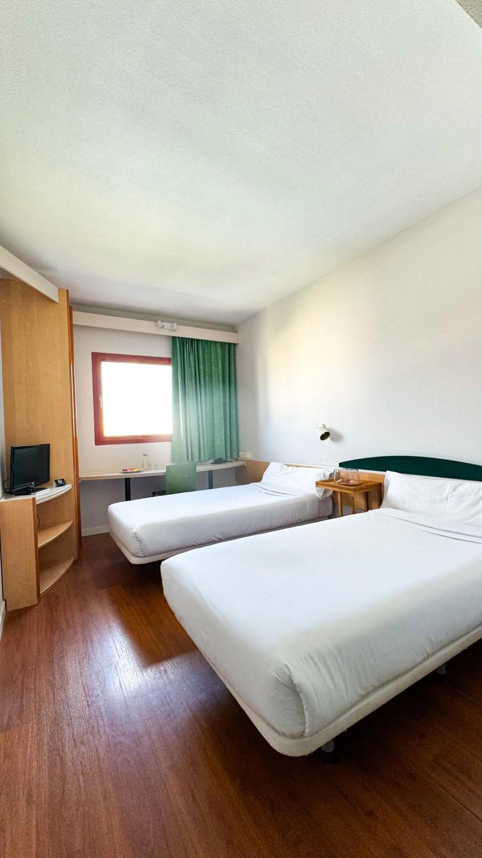 Bed in Hotel Iris Guadalajara