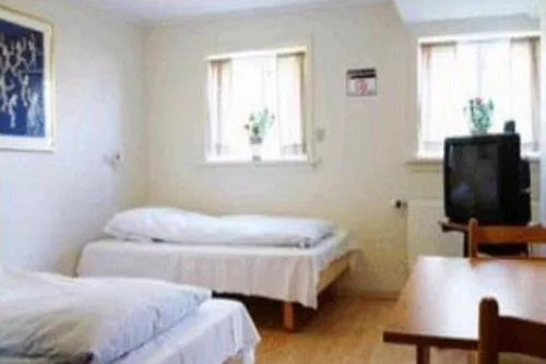 Bedroom, Bed in 62N Guesthouse - City Center