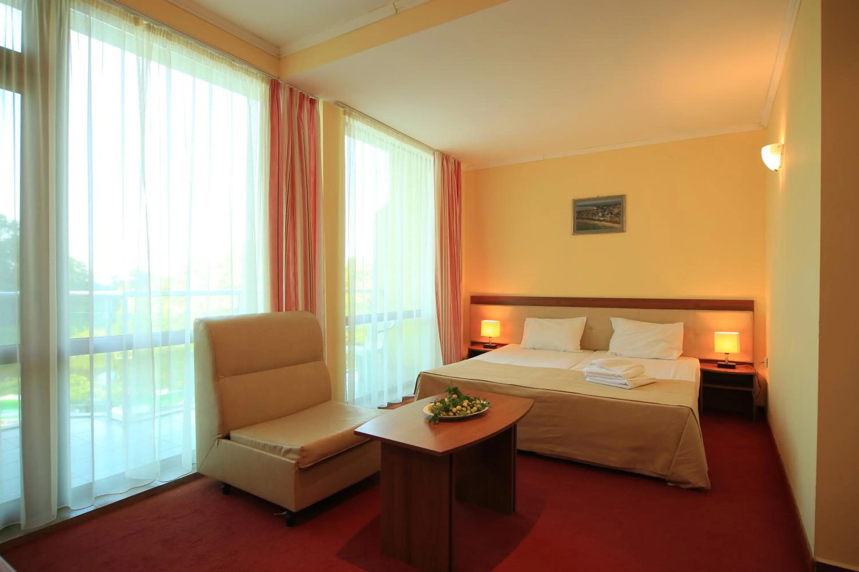 Living room, Bed in Perla Sun Beach Hotel - All Inclusive