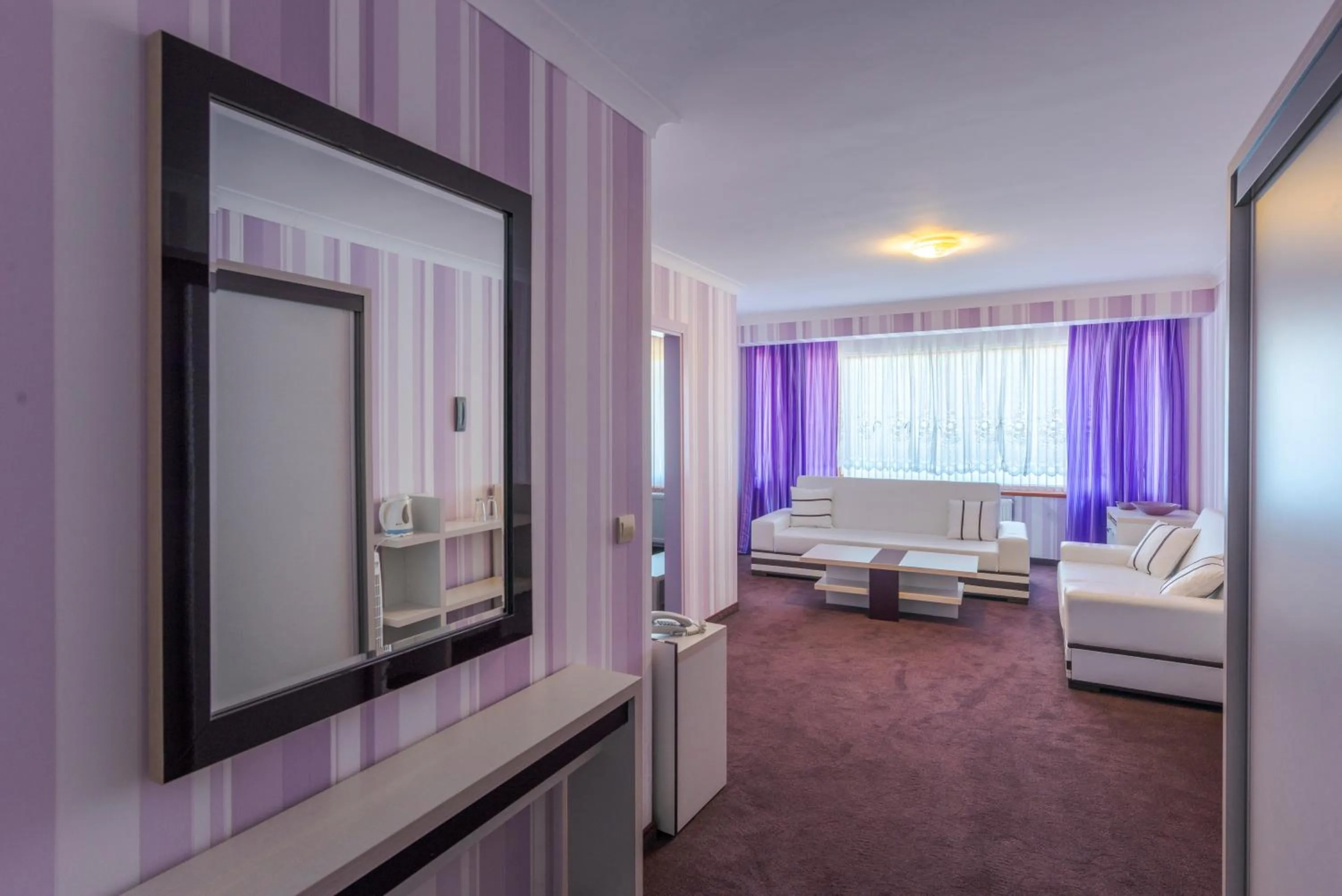 Bed in Семеен хотел Кристал