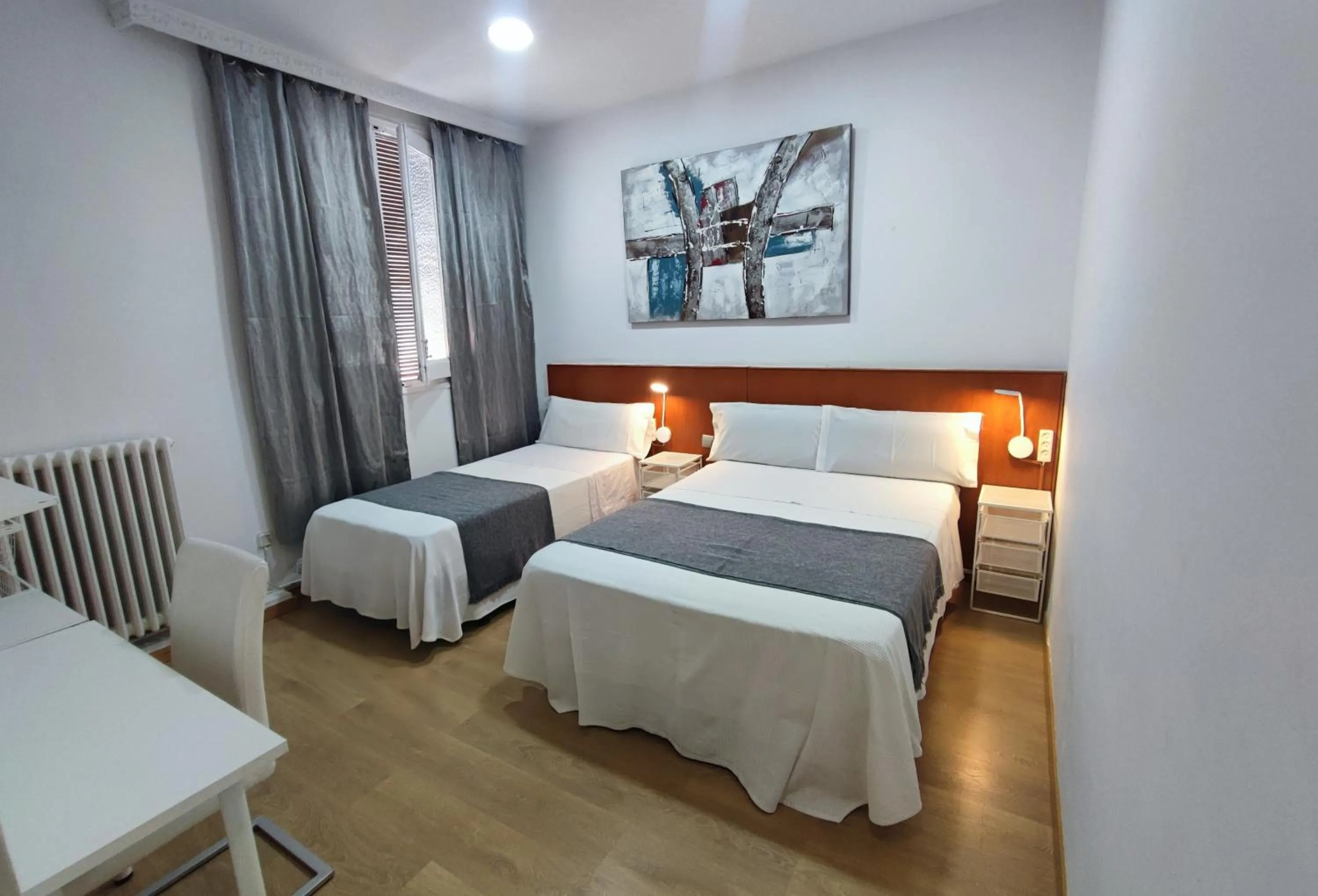 Photo of the whole room, Bed in Hostal Cervantes