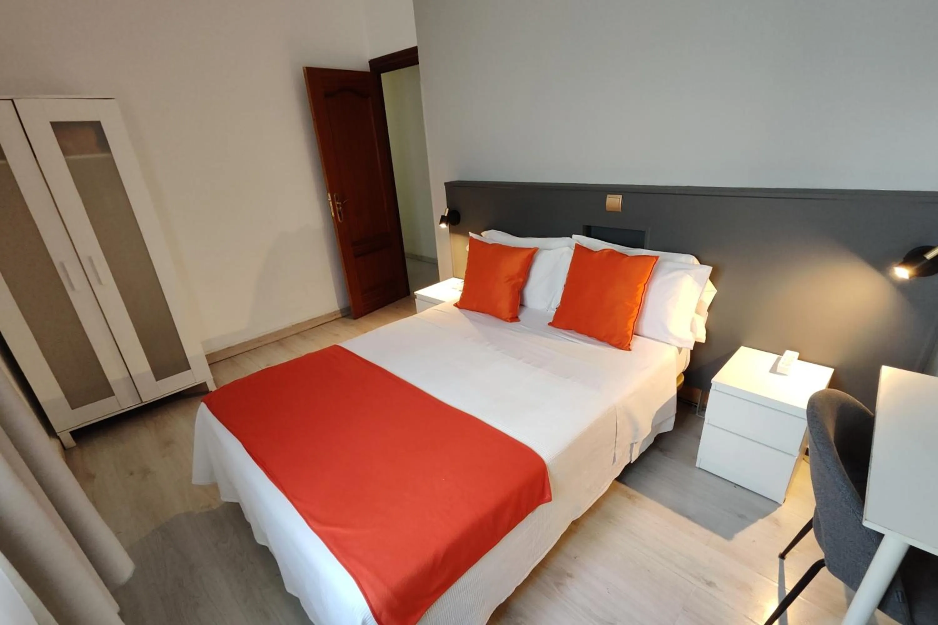 Photo of the whole room, Bed in Hostal Cervantes