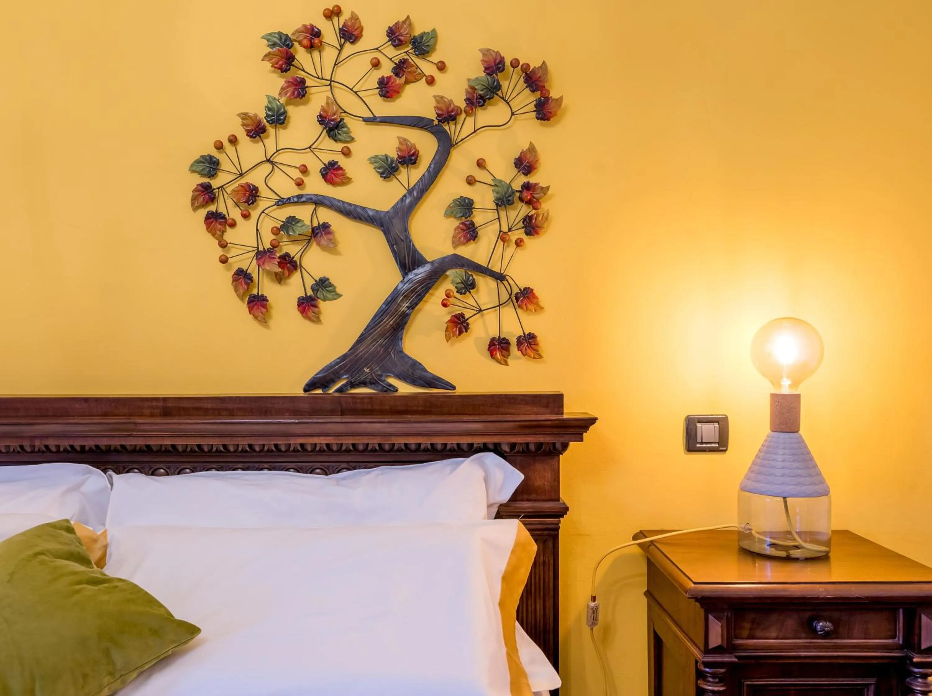 Bed in Cascina Gazzeri Country House