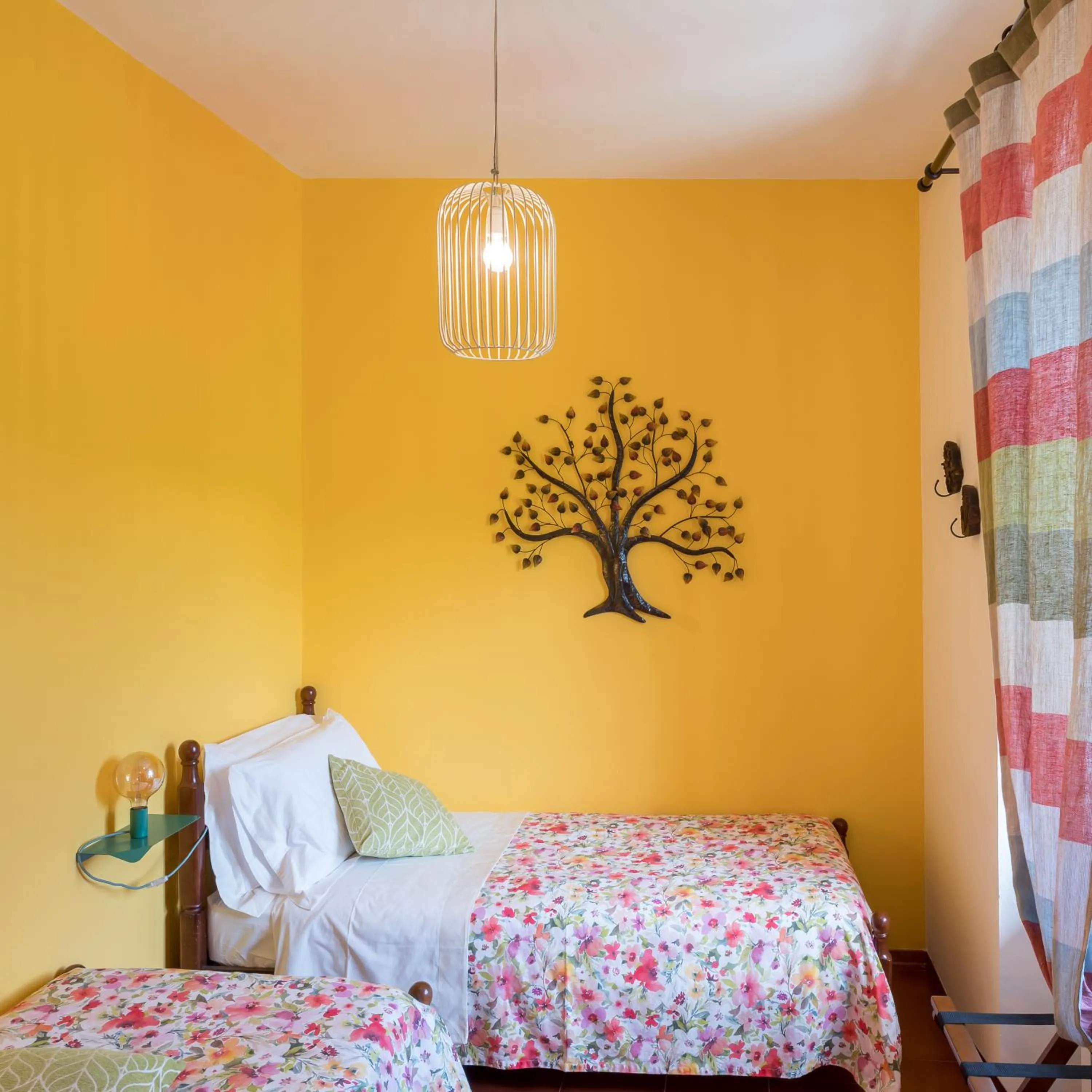 Bed in Cascina Gazzeri Country House