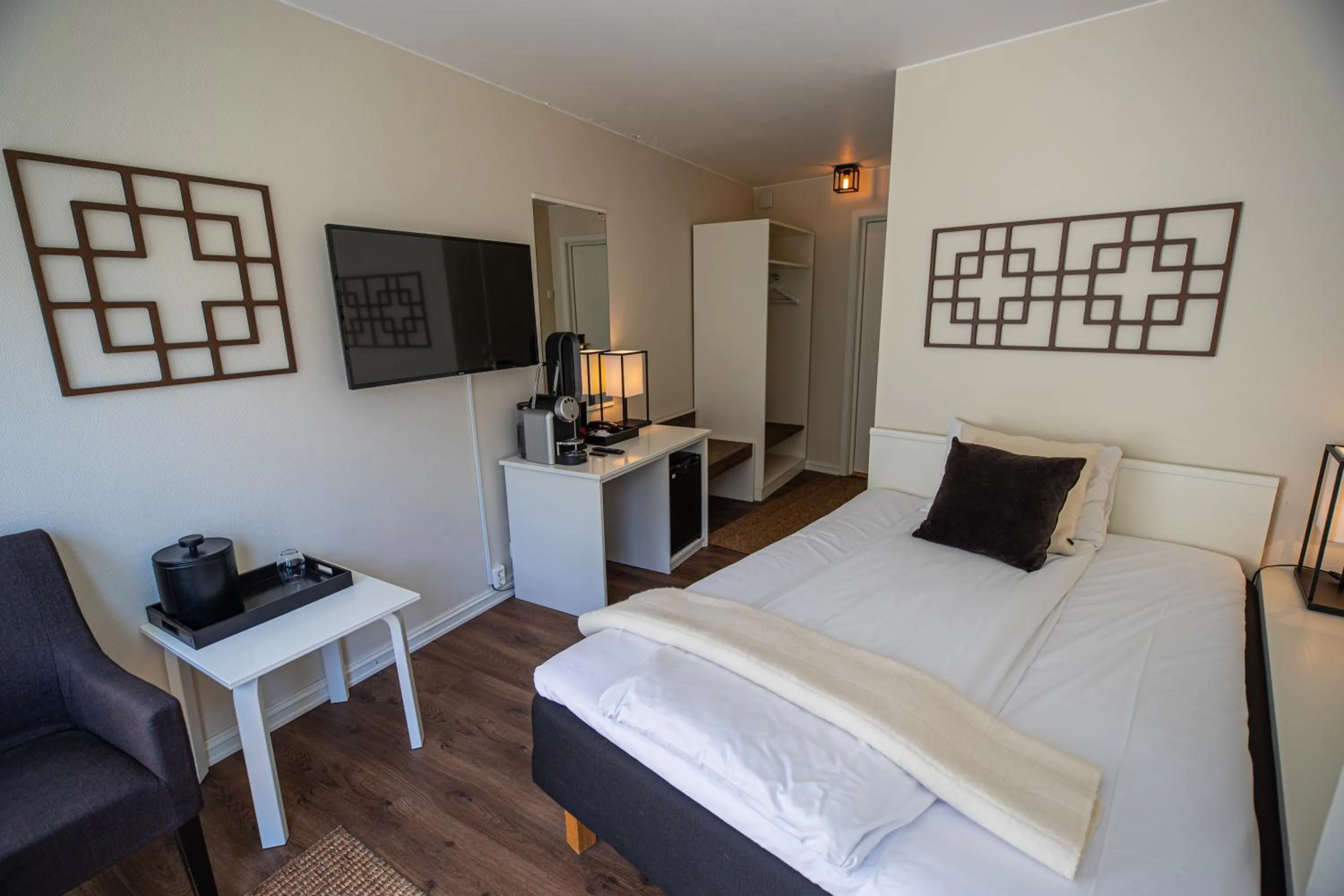 Bed in Grande Fjord Hotel