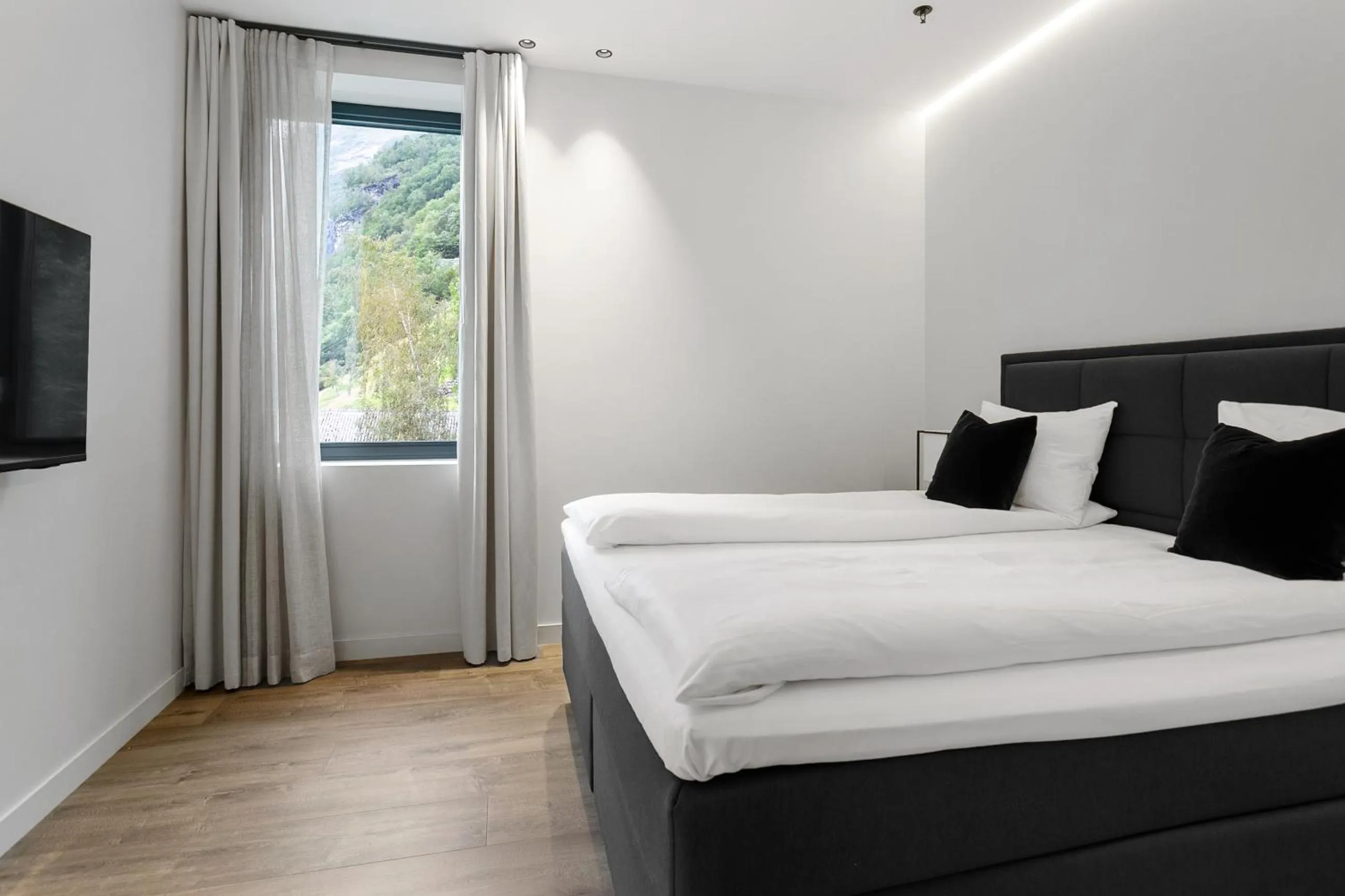 Bed in Grande Fjord Hotel