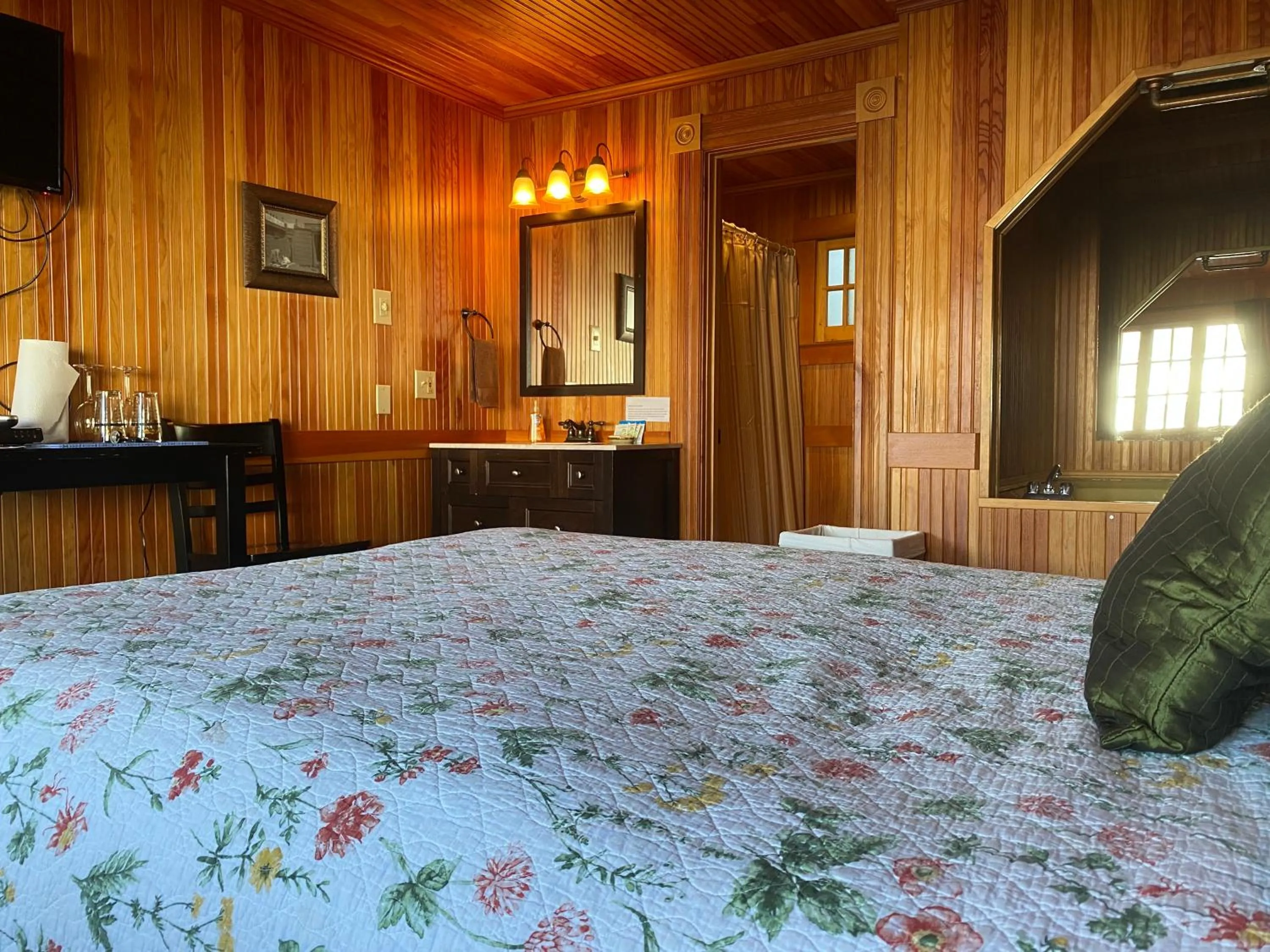 Bed in Whistling Winds Motel