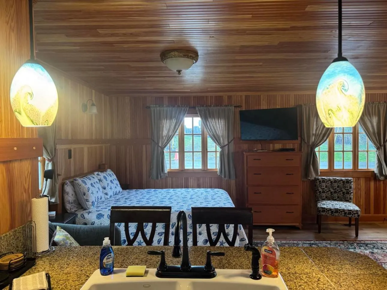 Bed in Whistling Winds Motel